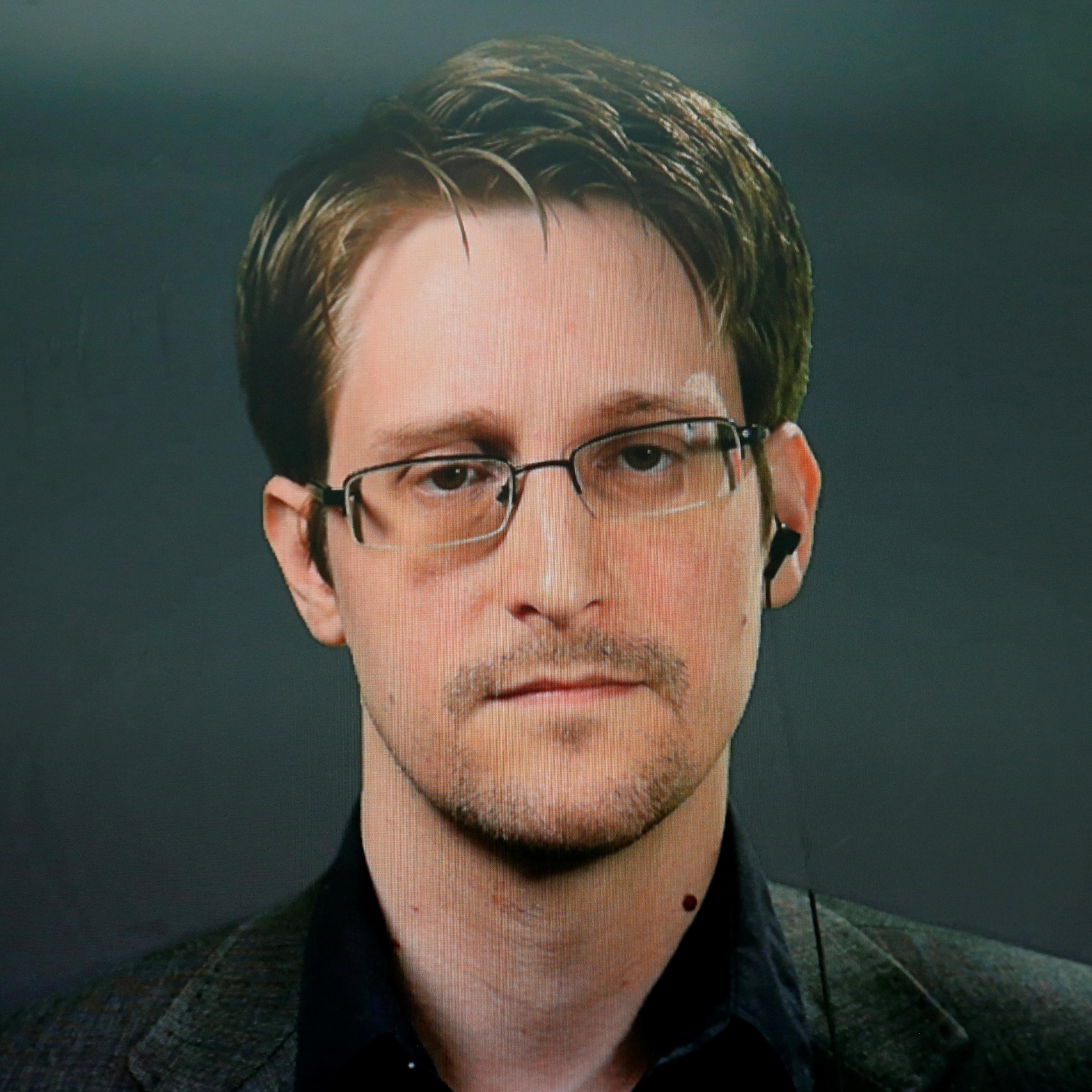 Edward Snowden speaks via video link during a news conference in New York City, U.S. September 14, 2016. REUTERS/Brendan McDermid - RTSNQO2
