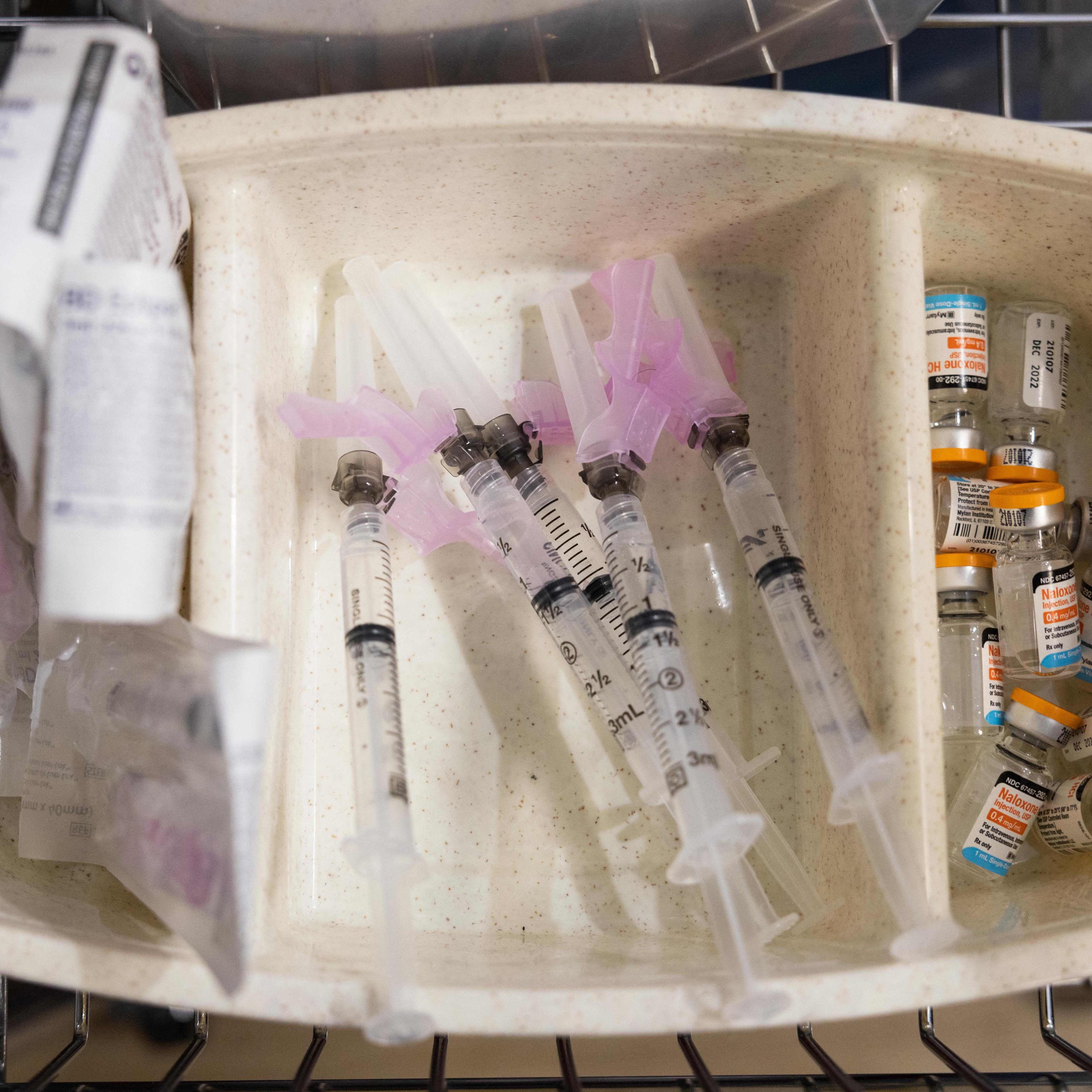 In this Nov. 30, 2021 photo, syringes and vials of Naloxone are shown during the media tour of the supervised drug injection site OnPoint, in New York.