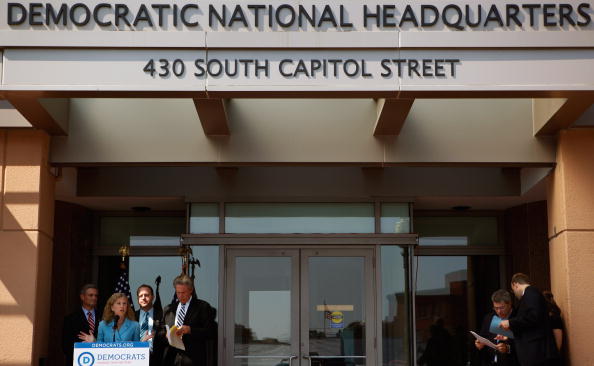 Democratic National Committee Vice Chairwoman Rep. Debbie Wasserman Schultz (D-FL) (2nd L) delivers remarks while responding to the House Republican's unveiling of their "Pledge to America" with (L-R) Rep. Robert Andrews (D-NJ), Rep. Jared Polis (D-CO) a