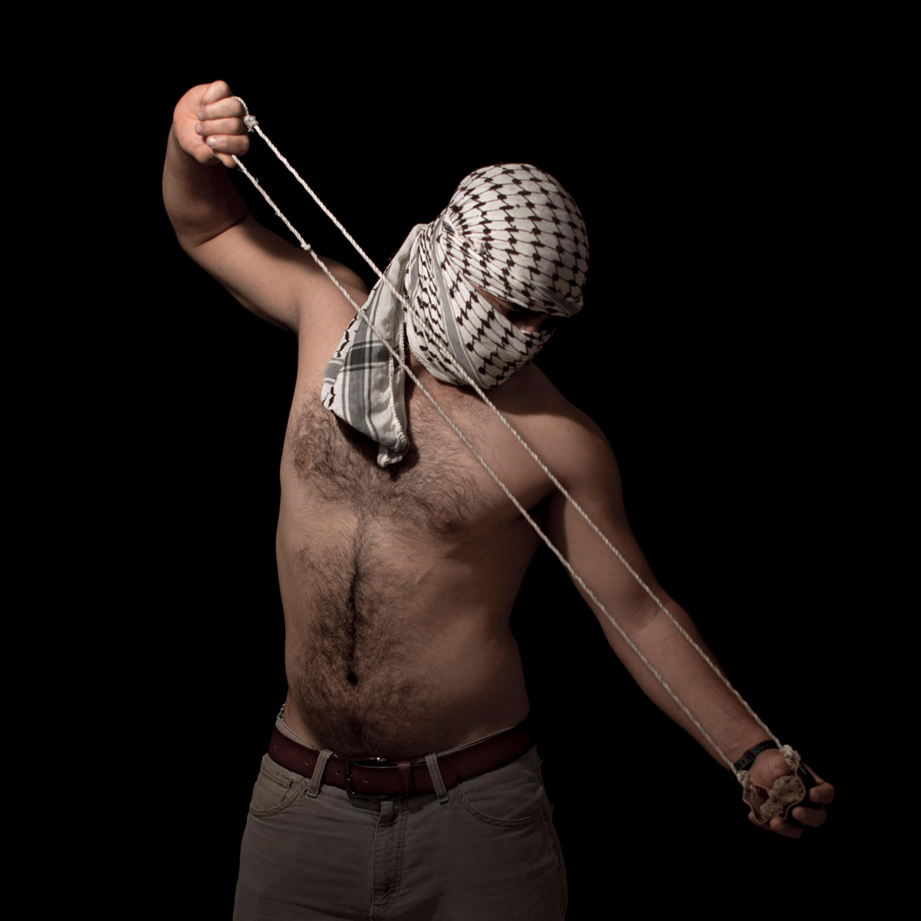 Portrait of a Palestinian stone thrower in the West Bank village of Bilin, near Ramallah. June 13, 2012.