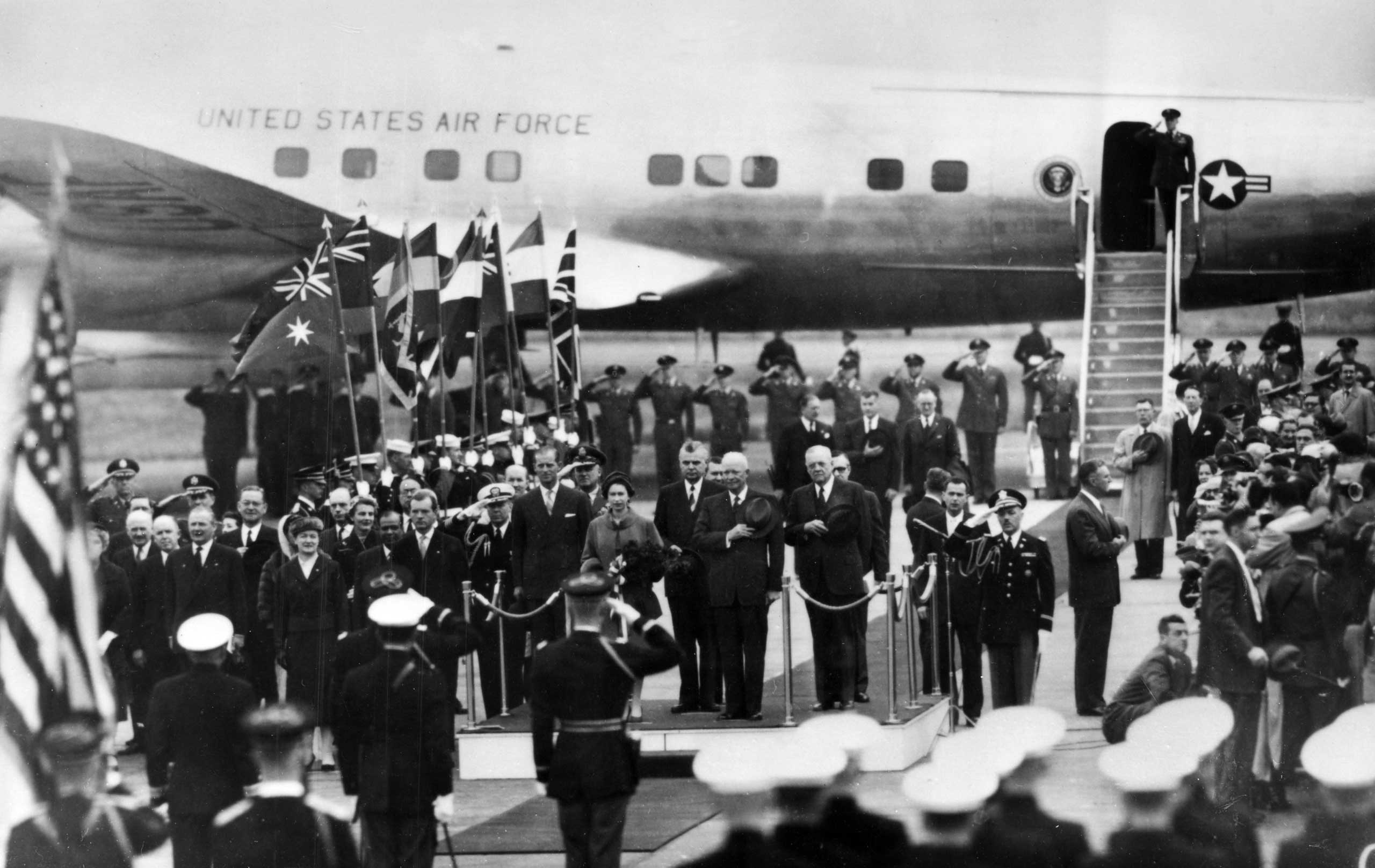 British Royalty, Royal Tour of the United States, pic: October 1957, Washington, USA, HM, Queen Elizabeth and the Duke of Edinburgh pictured alongside US, President Dwight Eisenhower at the airport welcome