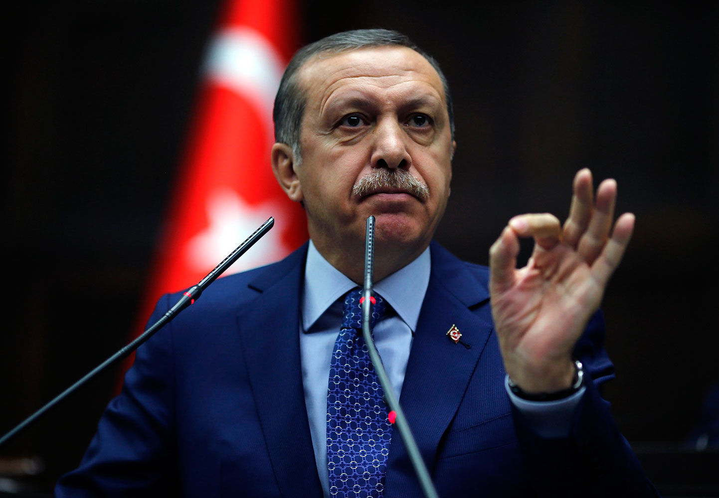 Turkey's Prime Minister Tayyip Erdogan addresses members of parliament from his ruling AK Party (AKP) during a meeting at the Turkish parliament in Ankara