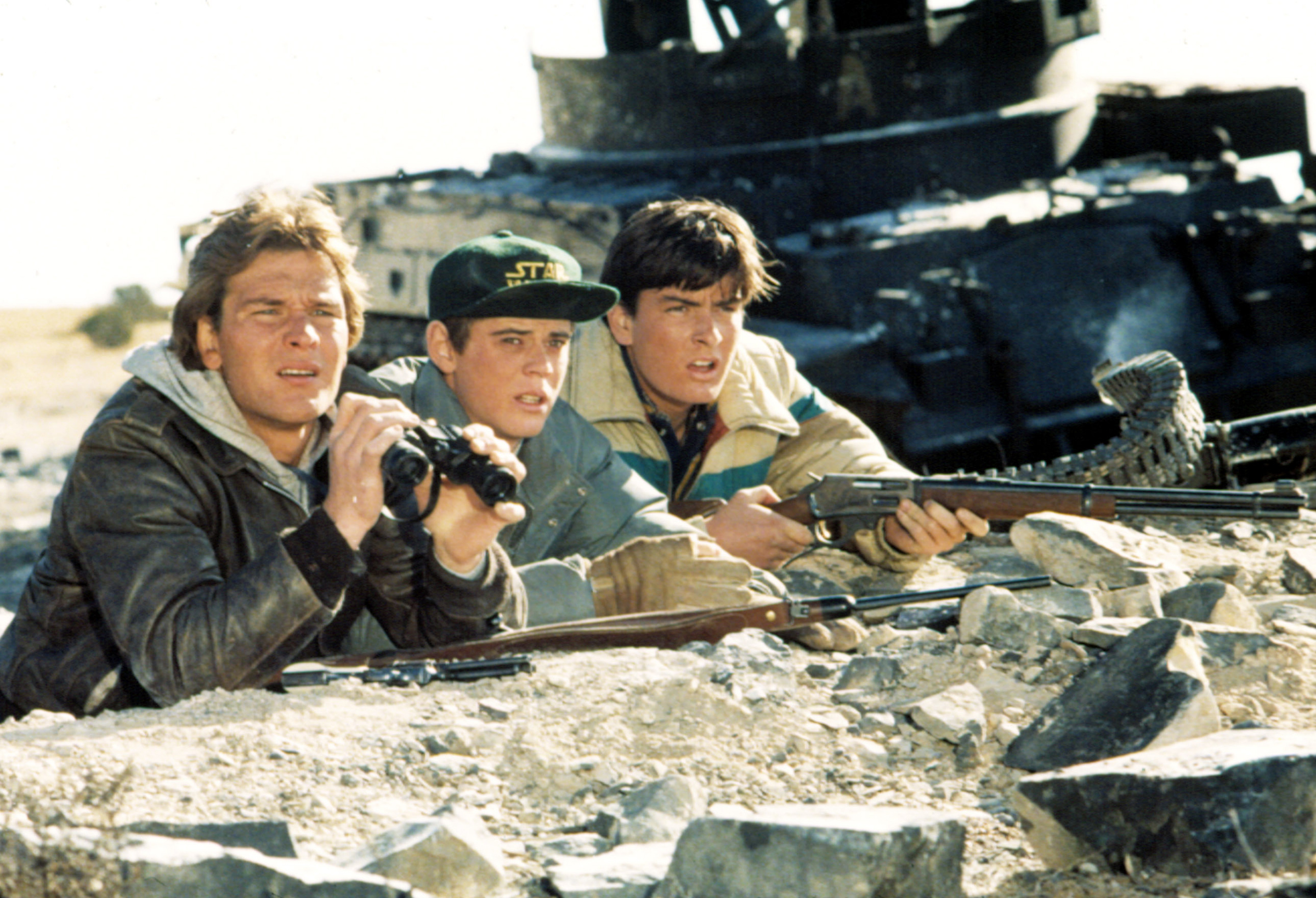 Patrick Swayze, C. Thomas Howell, and Charlie Sheen in Red Dawn, 1984.