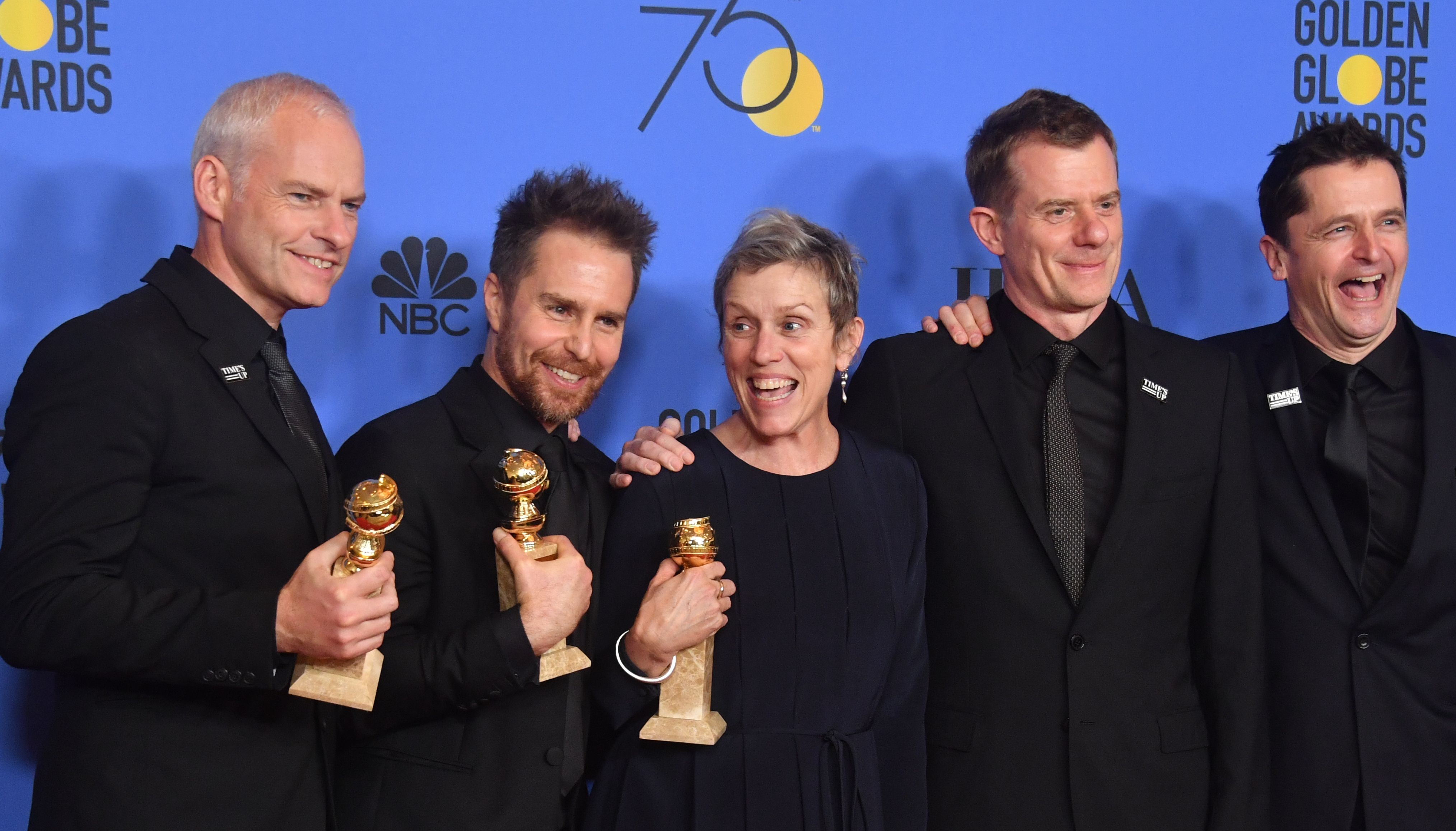 Martin McDonagh, Sam Rockwell, Frances McDormand, Graham Broadbent and Peter Czernin pose with the award for Best Motion Picture Drama for 'Three Billboards Outside Ebbing, Missouri' during the 75th Golden Globe Awards on January 7, 2018, in Beverly Hill