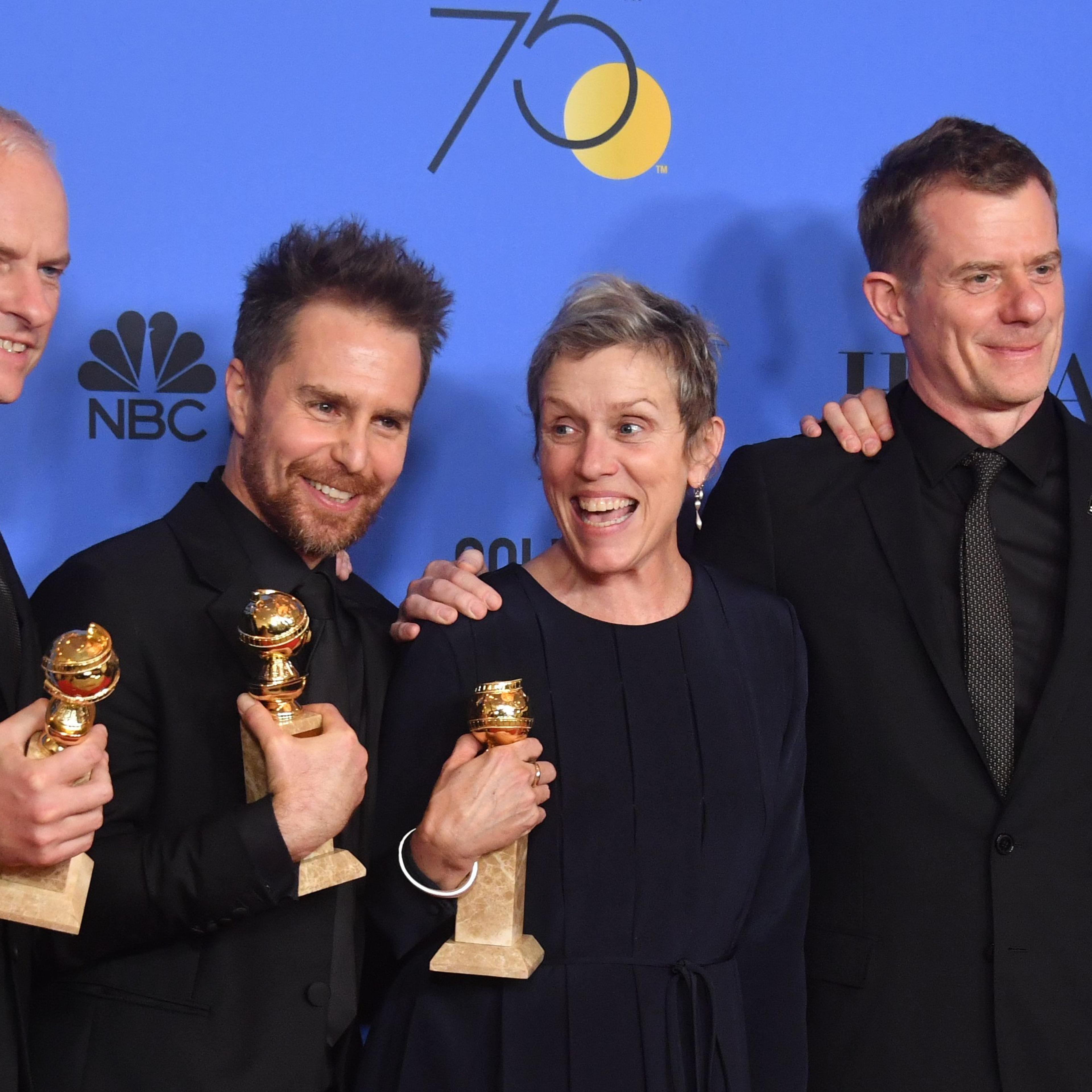 Martin McDonagh, Sam Rockwell, Frances McDormand, Graham Broadbent and Peter Czernin pose with the award for Best Motion Picture Drama for 'Three Billboards Outside Ebbing, Missouri' during the 75th Golden Globe Awards on January 7, 2018, in Beverly Hill