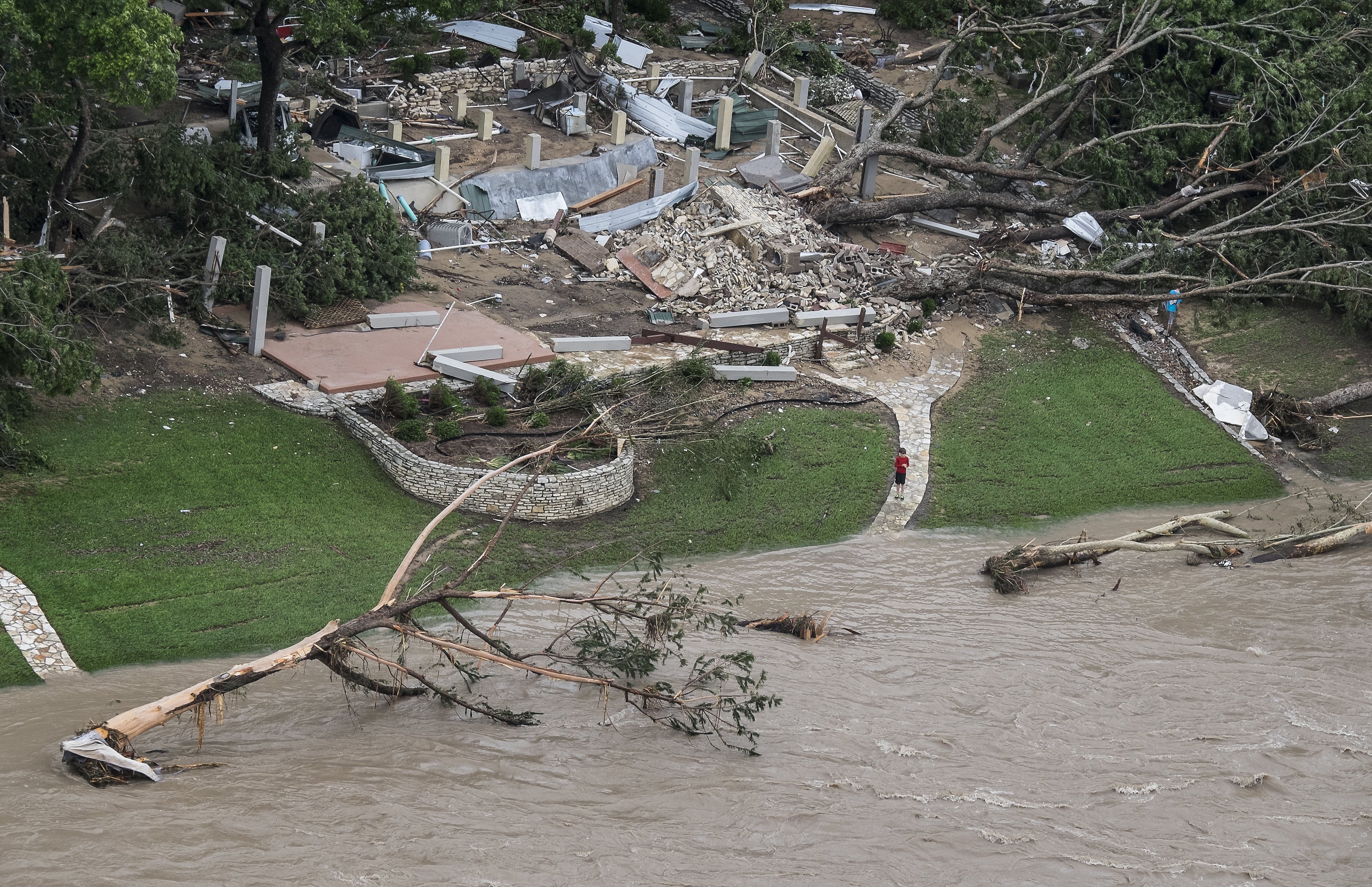 A home was taken off its foundation after heavy overnight rain caused flash flooding on the Blanco River in Wimberley, Texas on May 24, 2015.