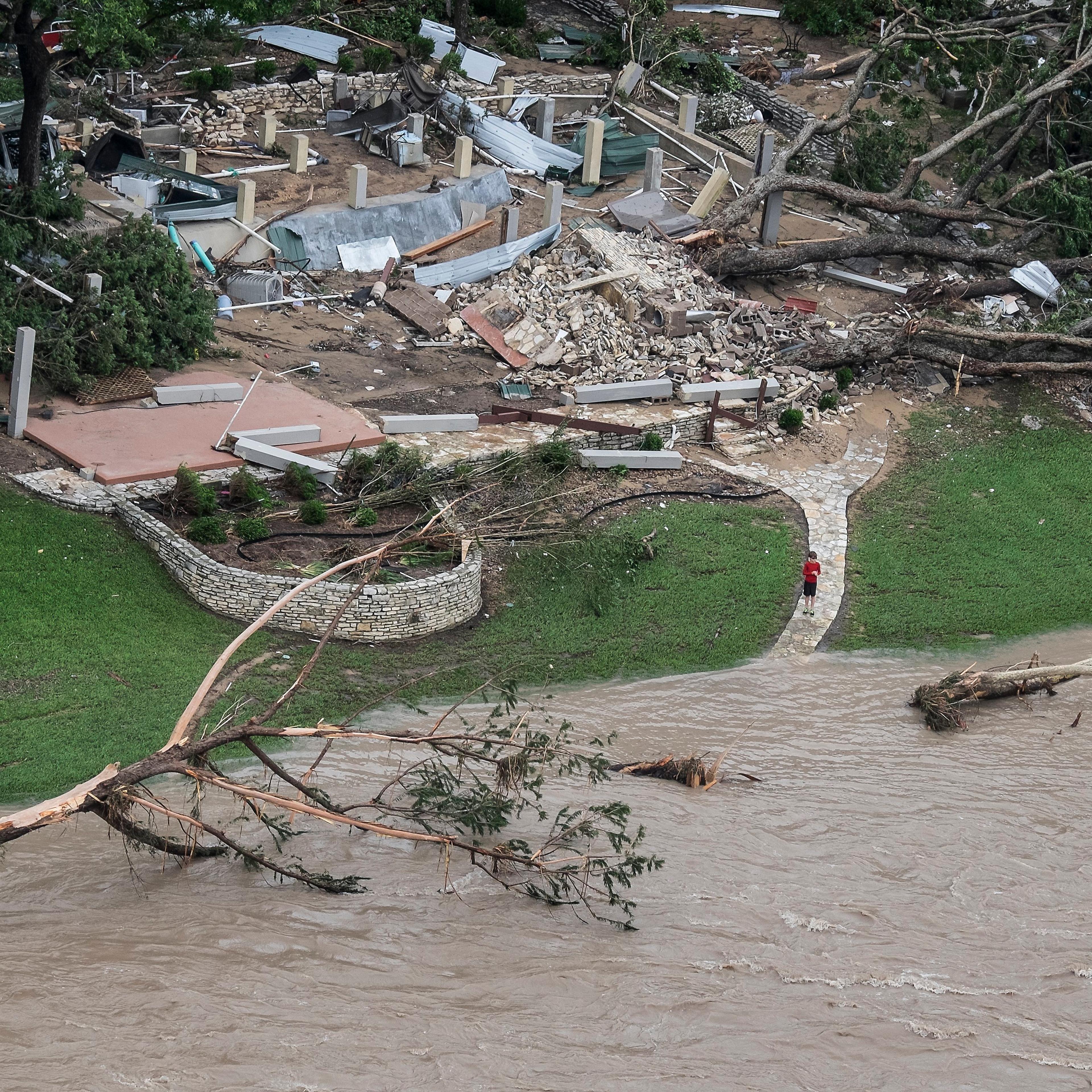 A home was taken off its foundation after heavy overnight rain caused flash flooding on the Blanco River in Wimberley, Texas on May 24, 2015.