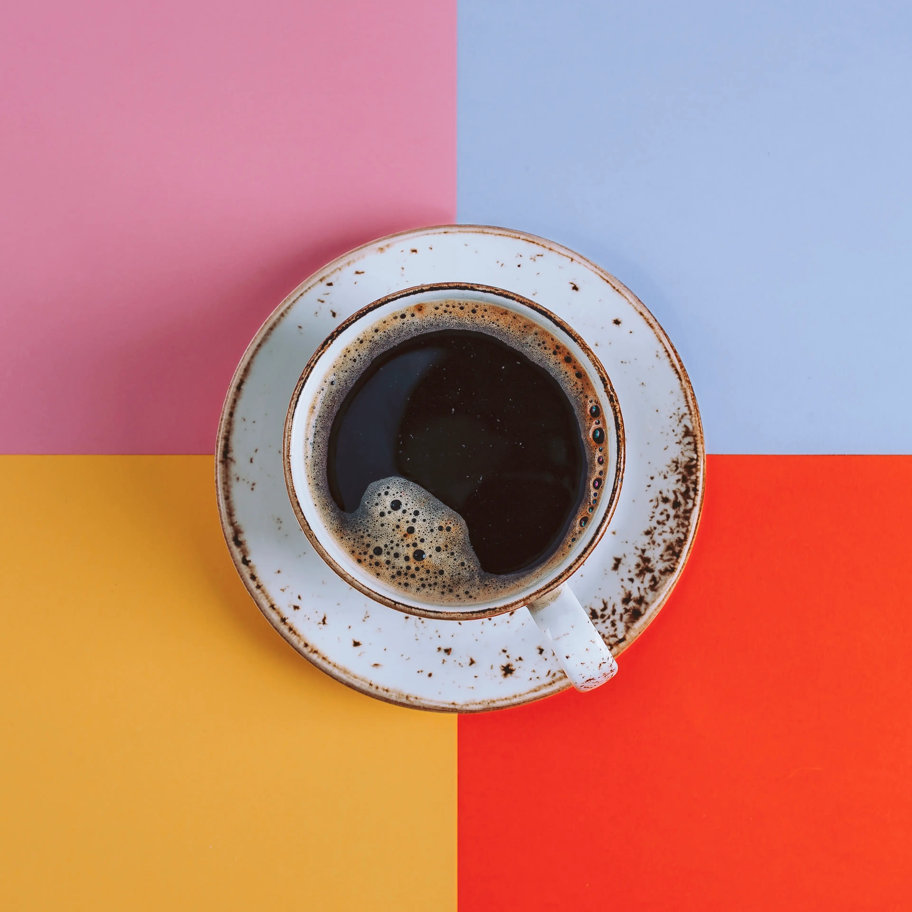 Cup of Coffee on colored background