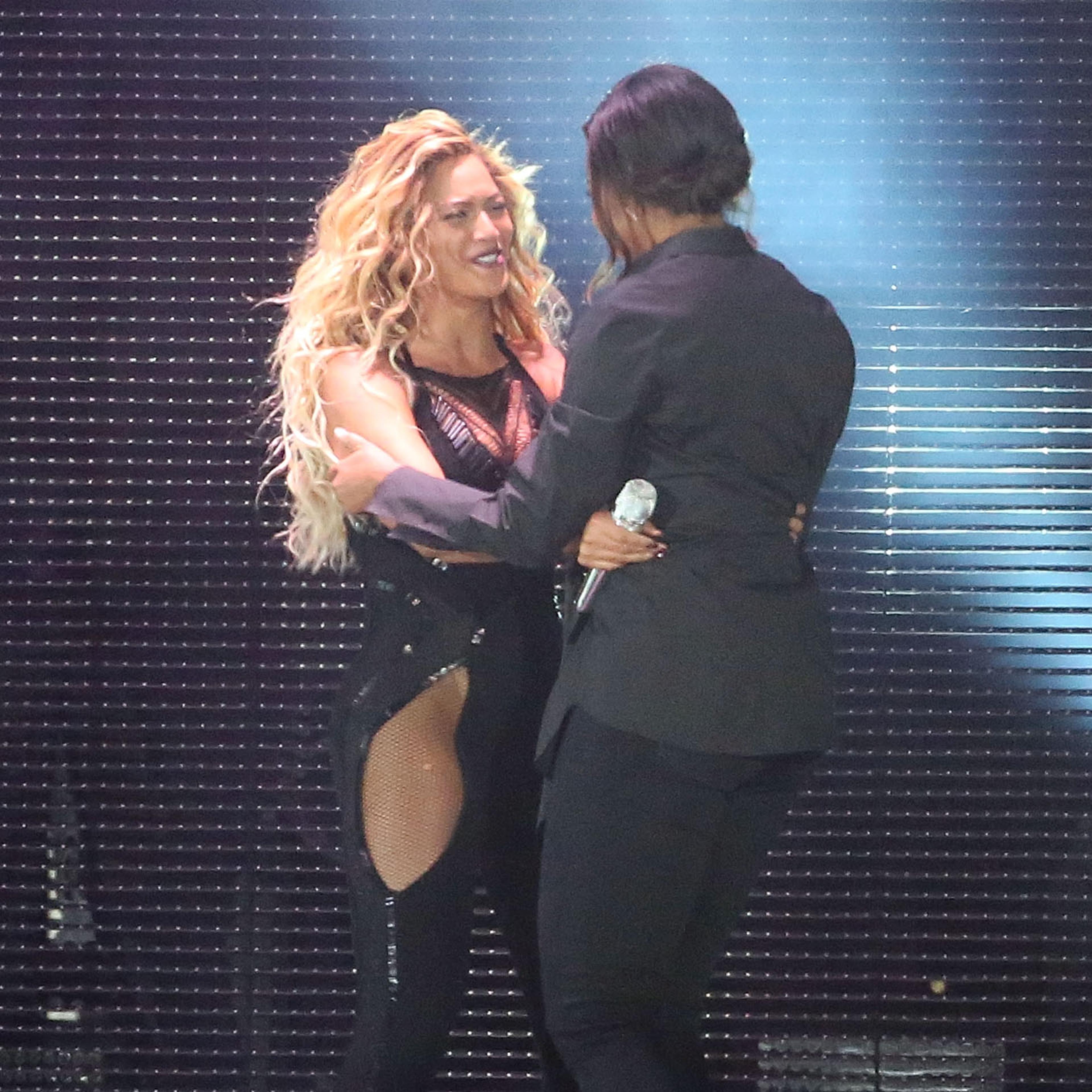 Beyonce and Michelle Obama hug during the 2015 Global Citizen Festival at Central Park on September 26, 2015 in New York City.