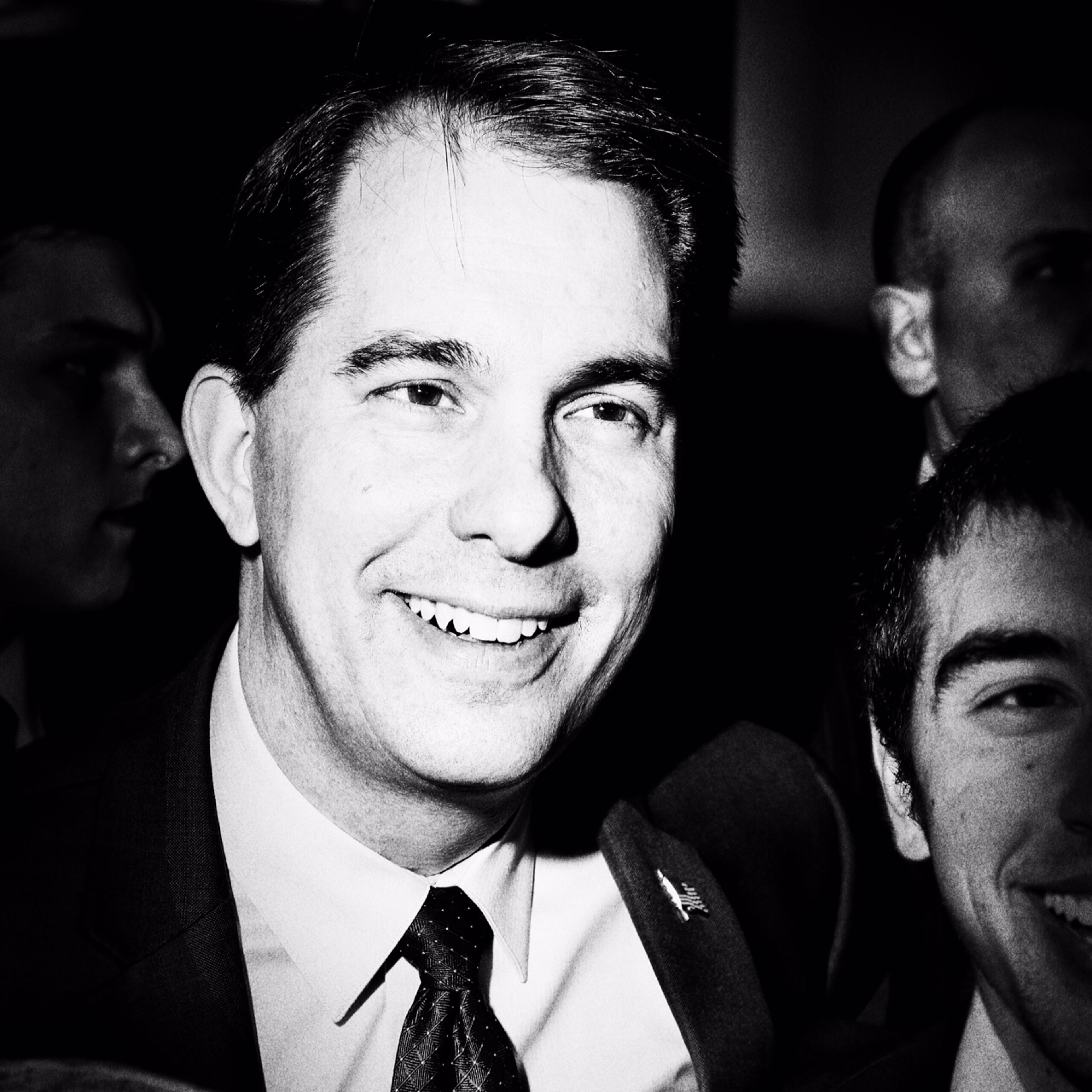 Scott Walker poses for photographs with supporters at CPAC in National Harbor, Md. on Feb. 27, 2015.