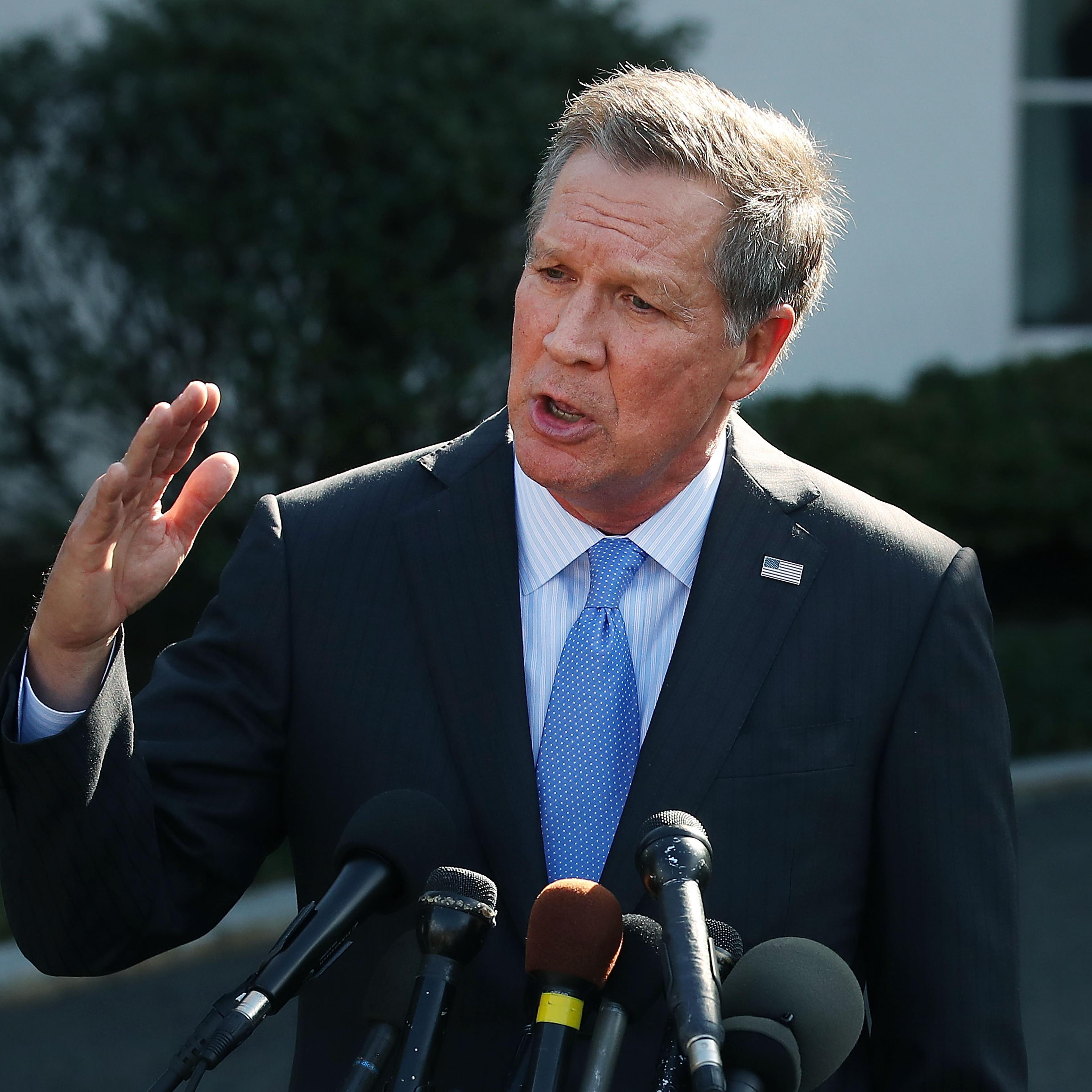 Ohio Governor John Kasich speaks to reporters after a closed meeting with U.S. President Donald Trump, on Feb. 24, 2017 in Washington, D.C.