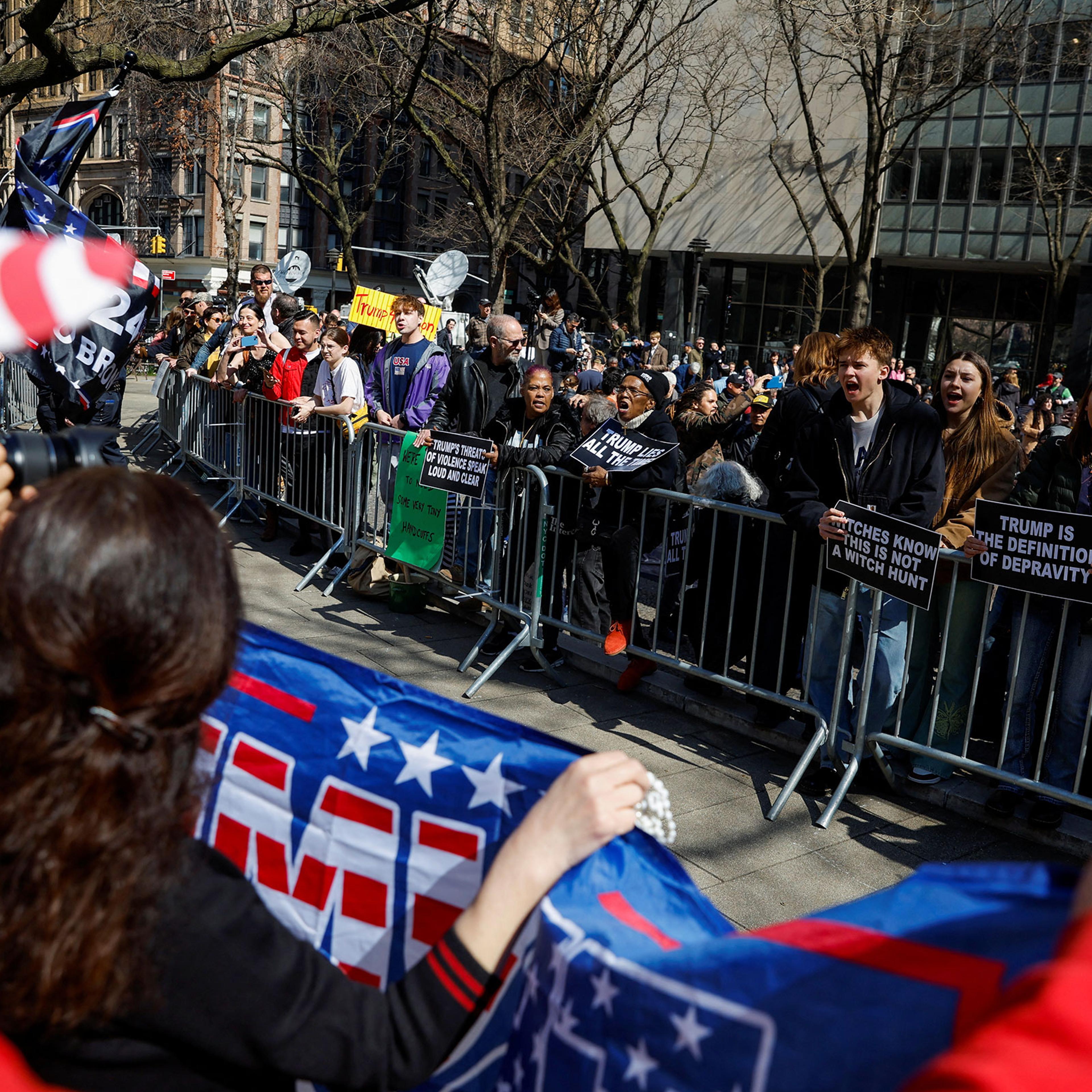 Anti-Trump protesters demonstrate facing Trump supporters outside Manhattan Criminal Courthouse in New York City, on April 4, 2023.