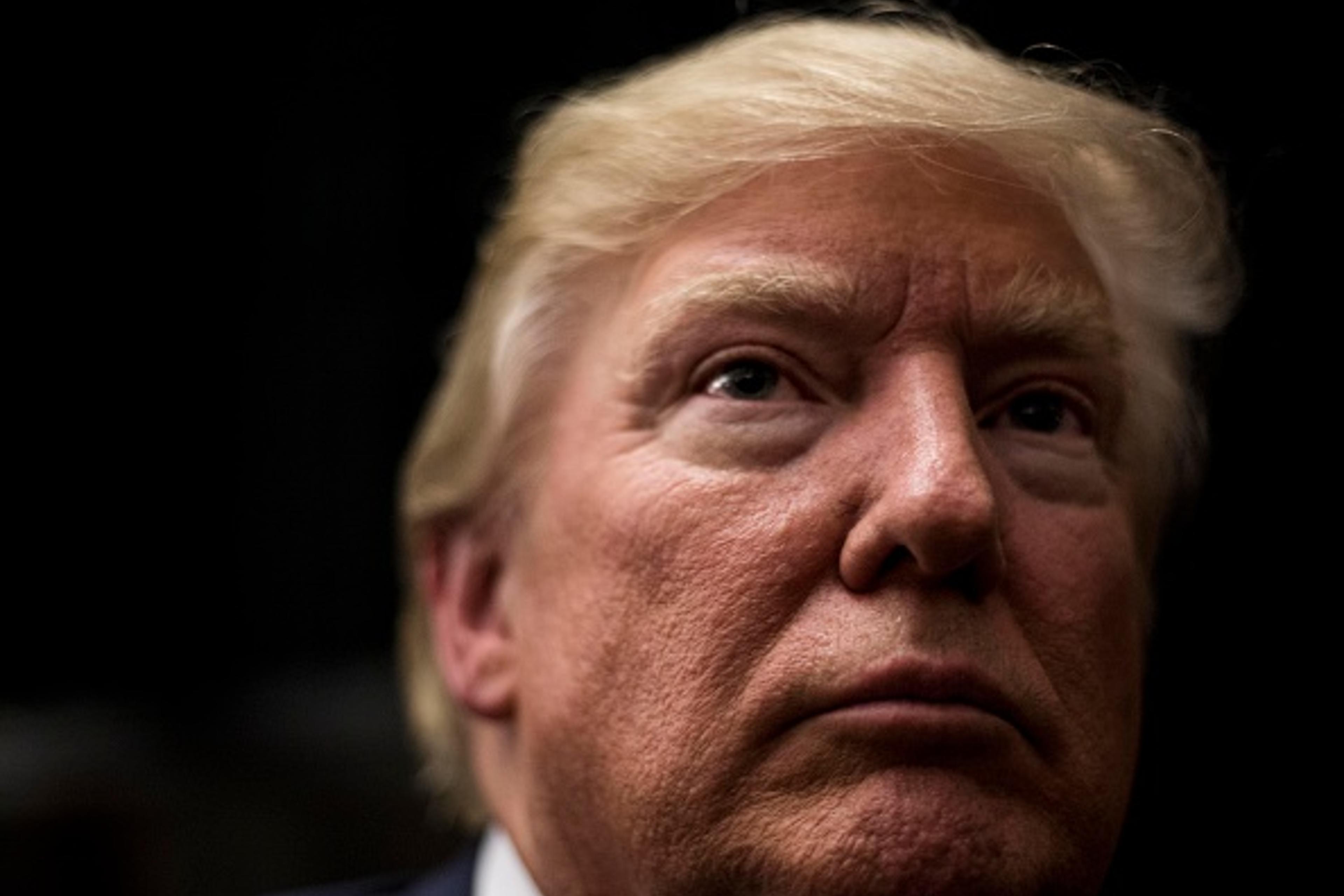 Donald Trump speaks to overflow crowds after a town hall meeting in Derry, New Hampshire on Wednesday, August 19, 2015.