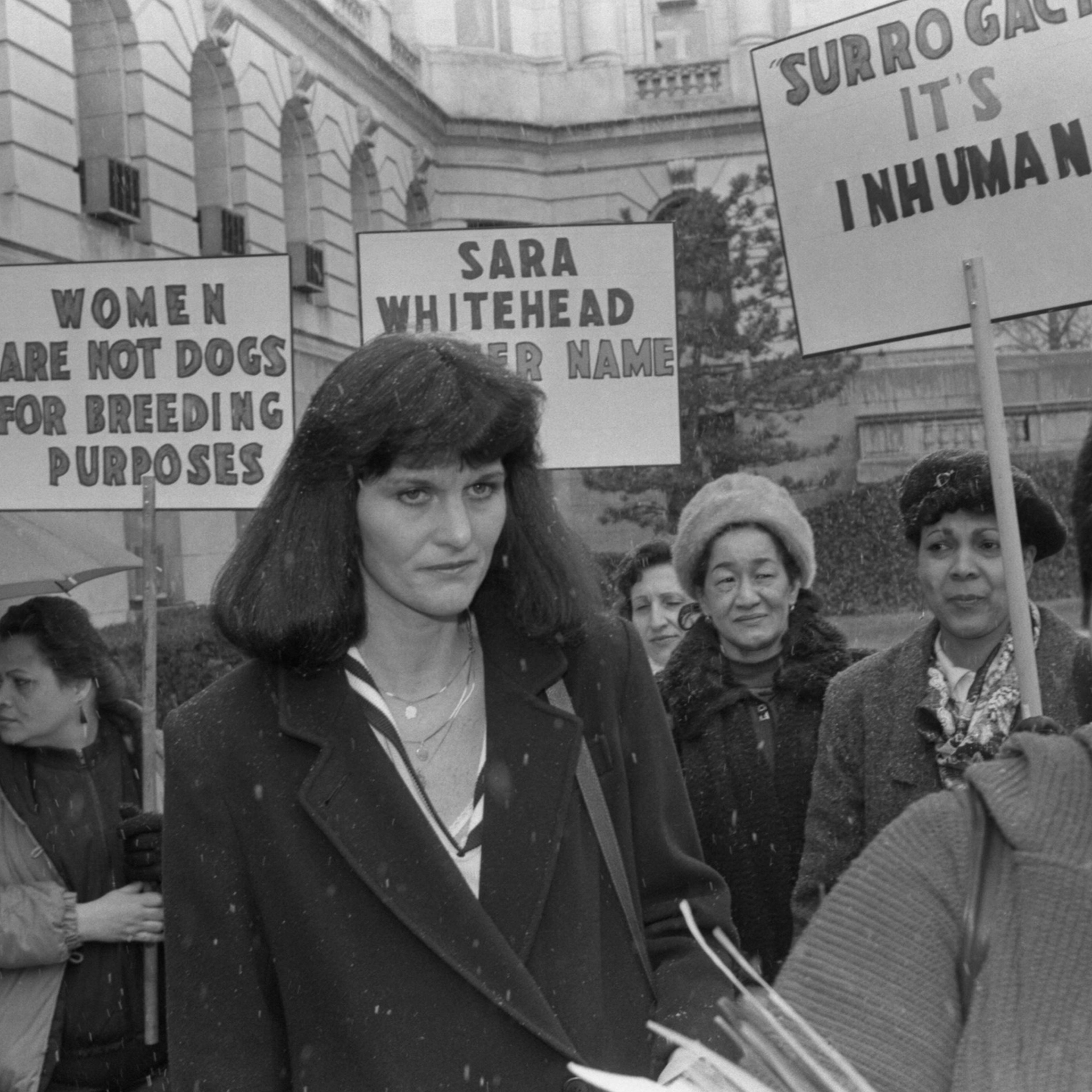 Surrogate mother Mary Beth Whitehead joins a group of women demonstrating on her behalf outside Bergen County courthouse on March 12, 1987, after the lawyers in the "Baby M" custody case delivered their summations.