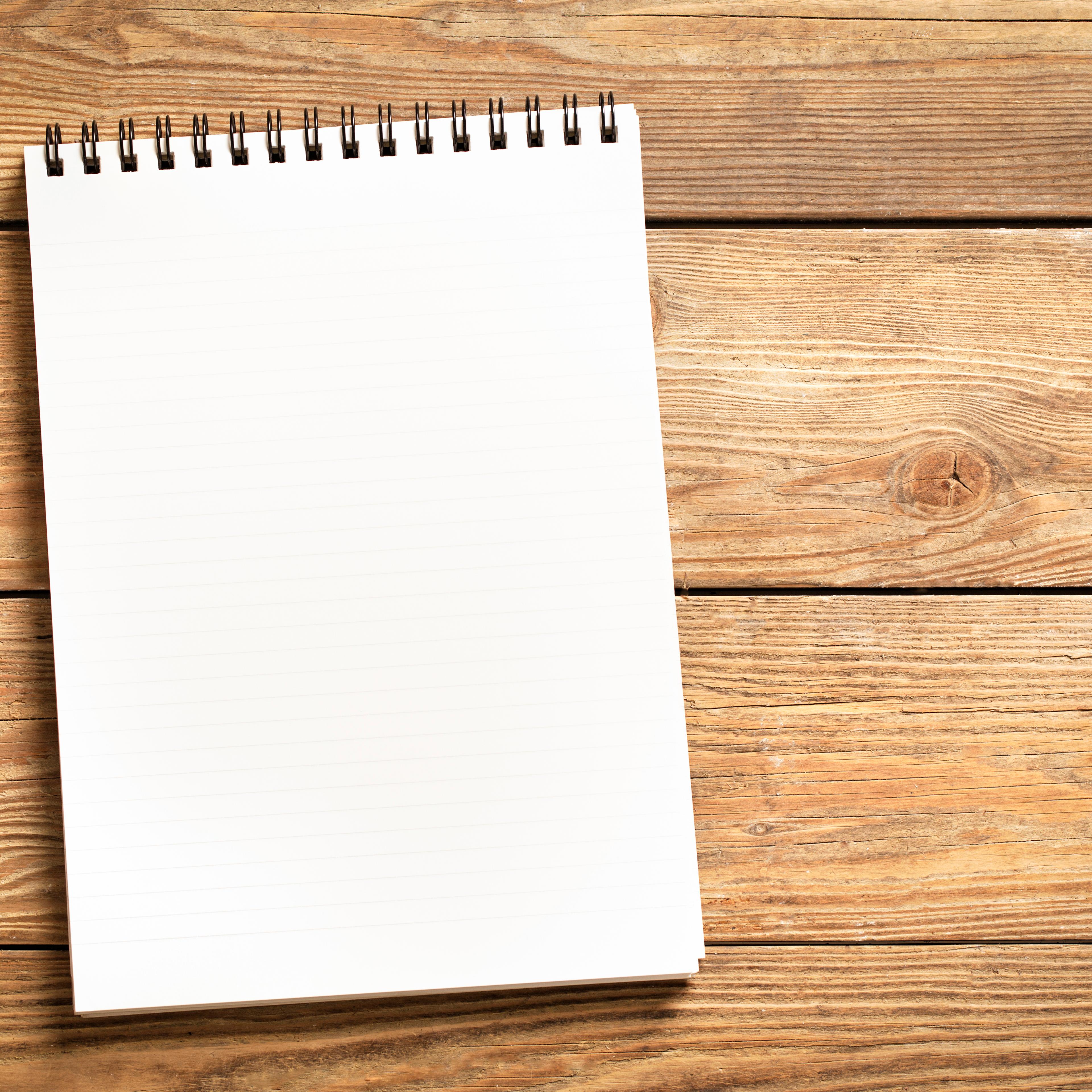 notepad-wooden-surface