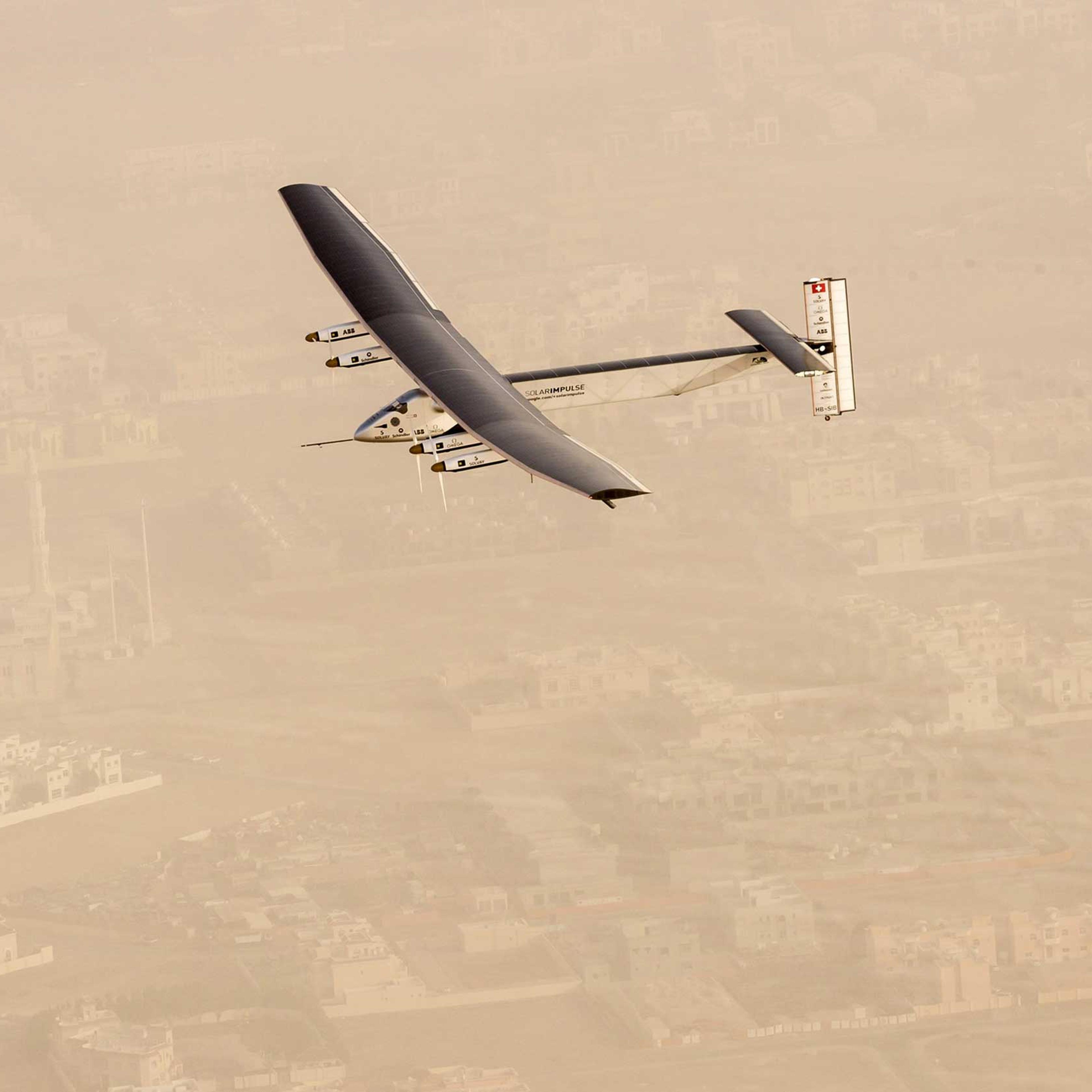 Solar Impulse 2, a solar-powered airplane, takes flight as it begins its historic round-the-world journey from Al Bateen Airport in Abu Dhabi on March 9, 2015.