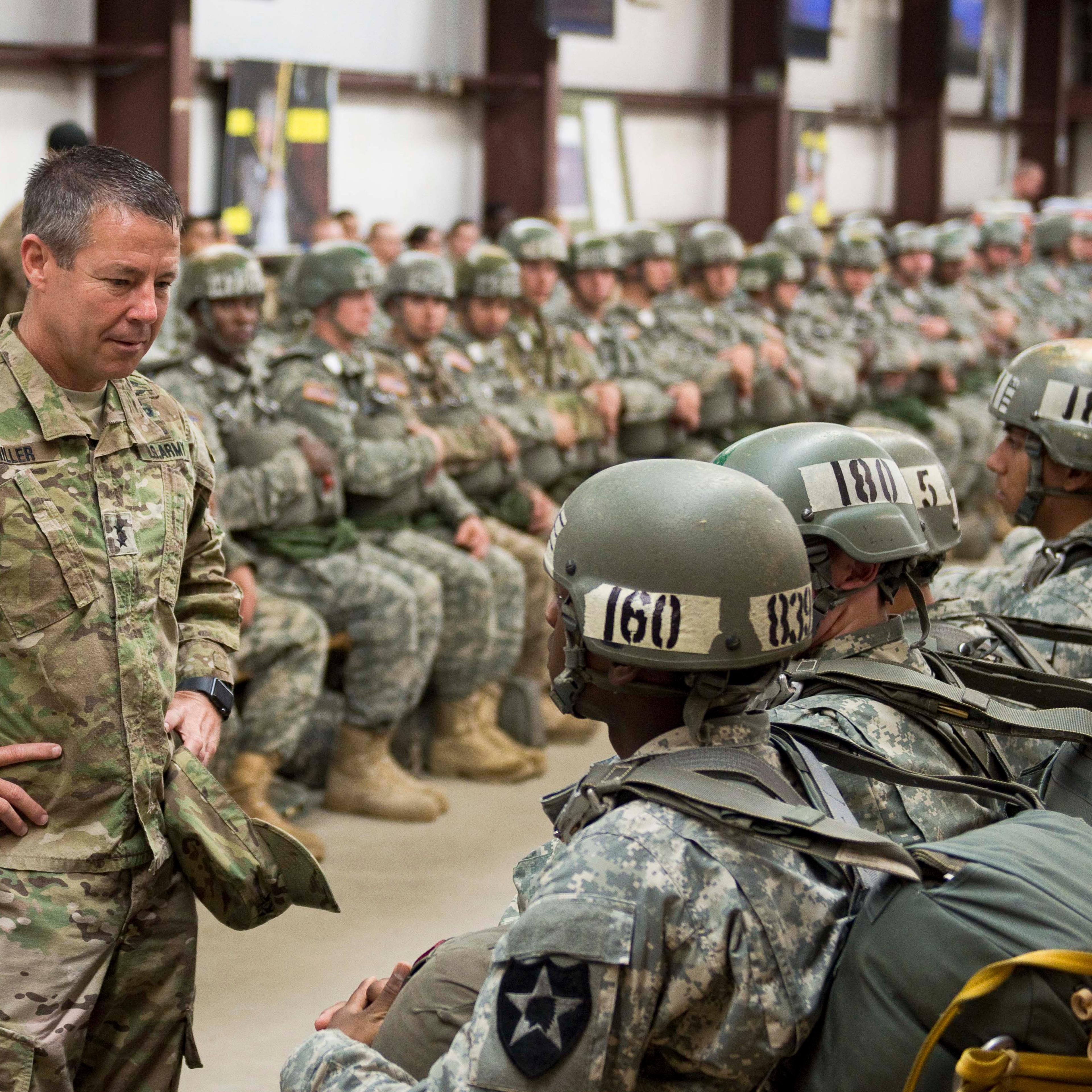 Lt. Gen. Scott Miller, then-commanding general of Fort Benning and the Maneuver Center of Excellence, talks with soldiers before one of the Airborne School jumps in 2015.