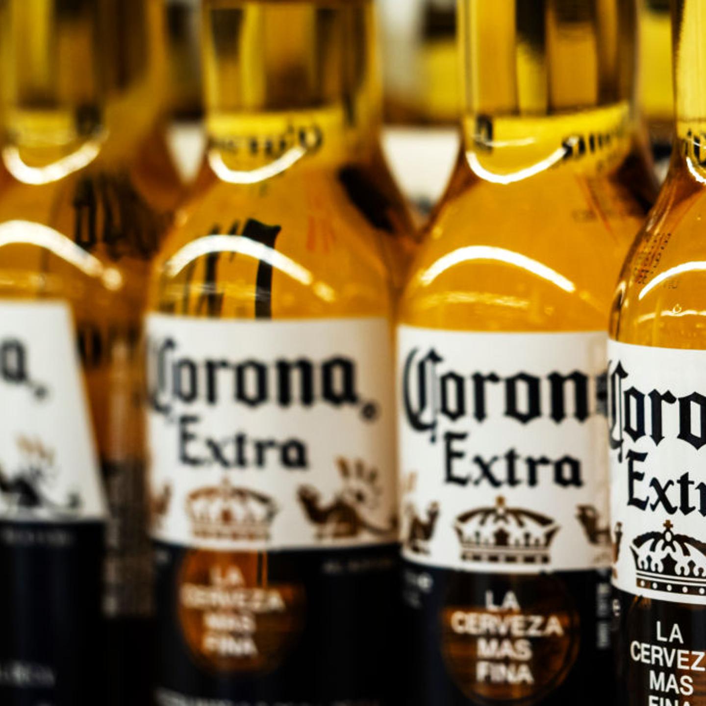 Detail of lined up Corona beer bottles seen on the store