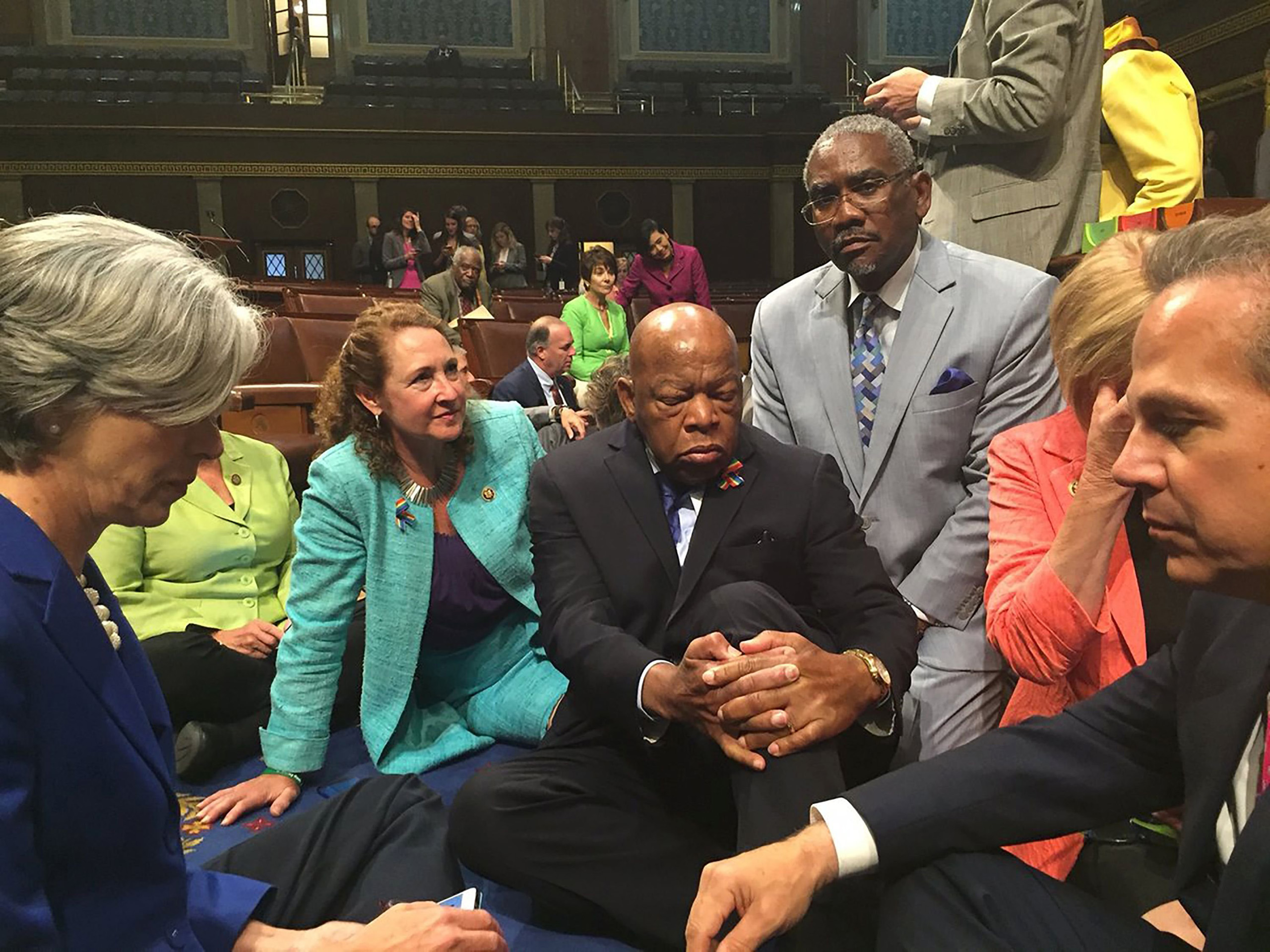 Rep. Esty(2n-L) with Rep. John Lewis(C) and other members of Congress staging a sit-in on the floor of the US House of Representatives in Washington, D.C. on June 22, 2016.