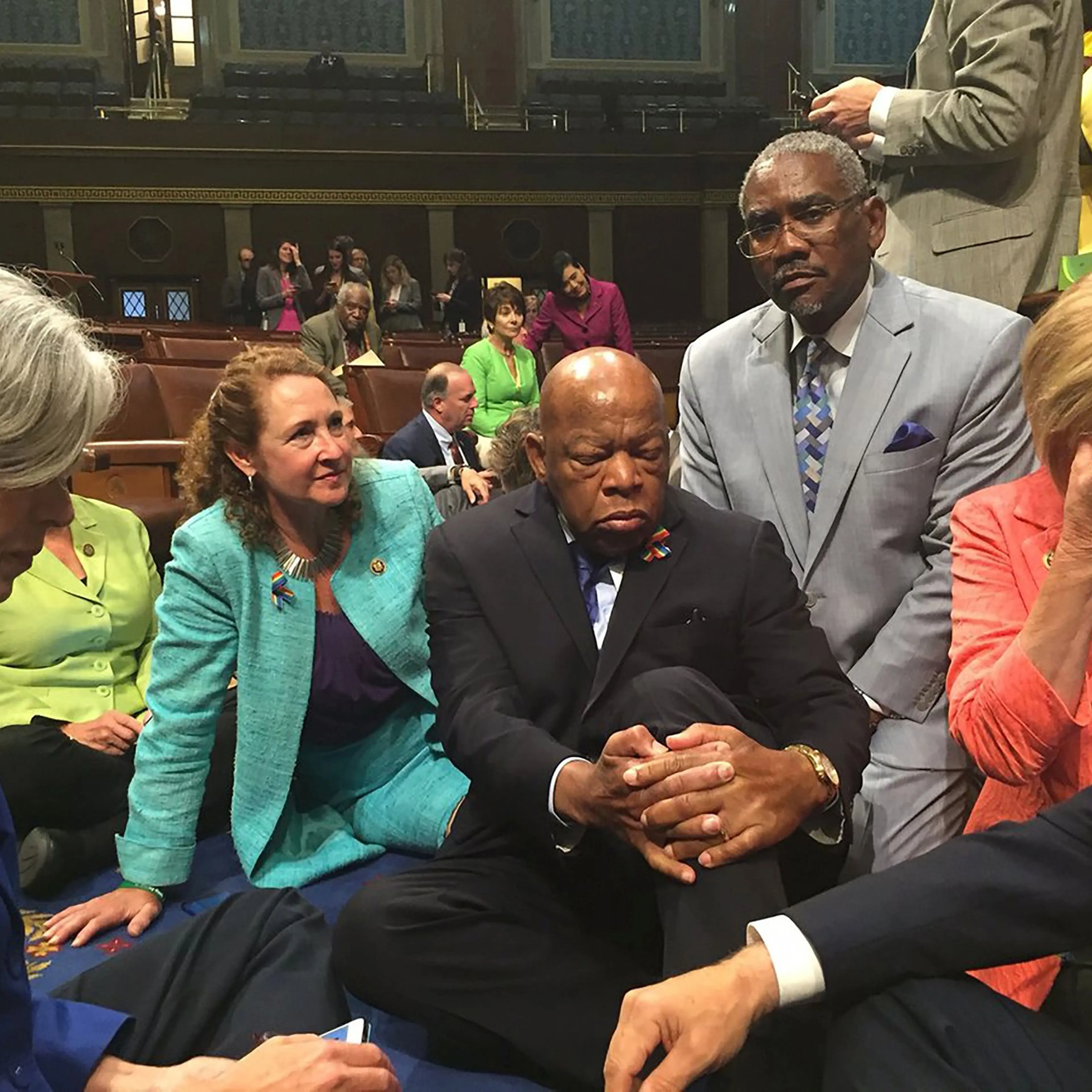 Rep. Esty(2n-L) with Rep. John Lewis(C) and other members of Congress staging a sit-in on the floor of the US House of Representatives in Washington, D.C. on June 22, 2016.