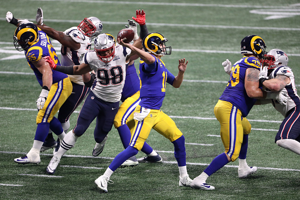 Jared Goff #16 of the Los Angeles Rams looks to pass during the second half against the New England Patriots during Super Bowl LIII at Mercedes-Benz Stadium on February 03, 2019 in Atlanta, Georgia.