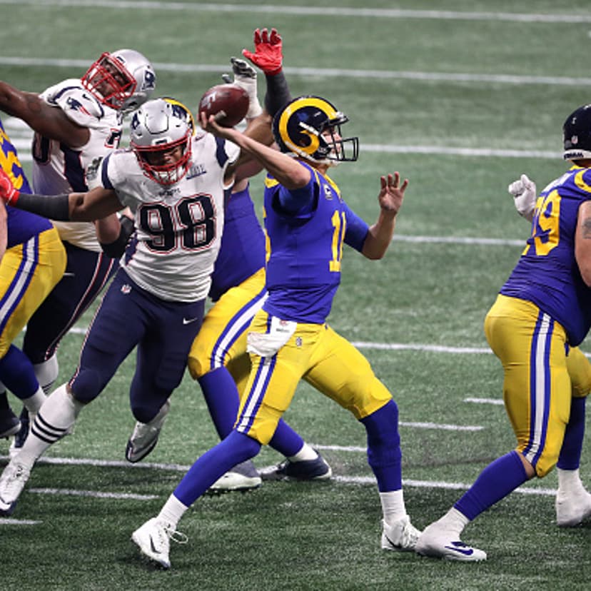 Jared Goff #16 of the Los Angeles Rams looks to pass during the second half against the New England Patriots during Super Bowl LIII at Mercedes-Benz Stadium on February 03, 2019 in Atlanta, Georgia.