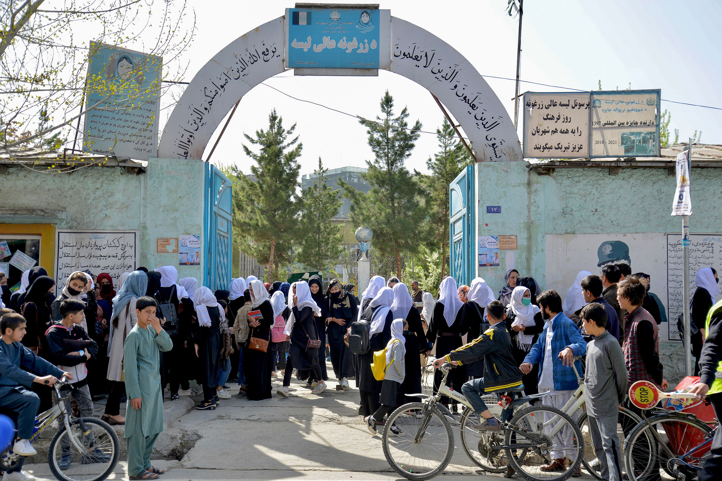 Girls leave their school following order of closure just hours after reopening in Kabul on March 23, 2022.