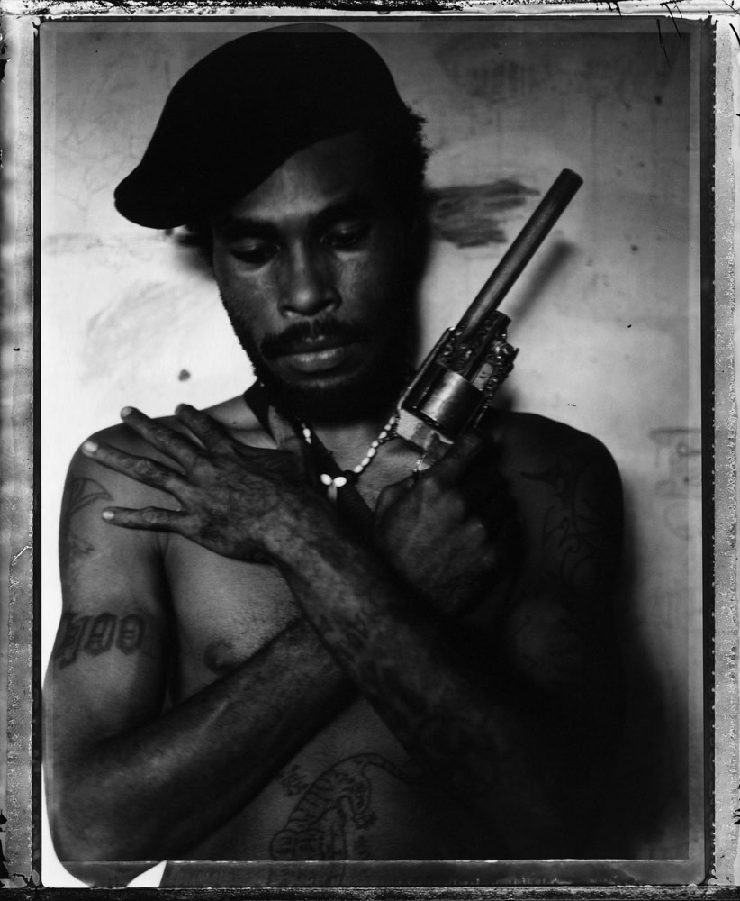 <i>Raskols: The Gangs of Papua New Guinea, published by powerHouse Books this month.</i></br>All portraits in this series were taken in Papua New Guinea in 2004</i></br>Omsy