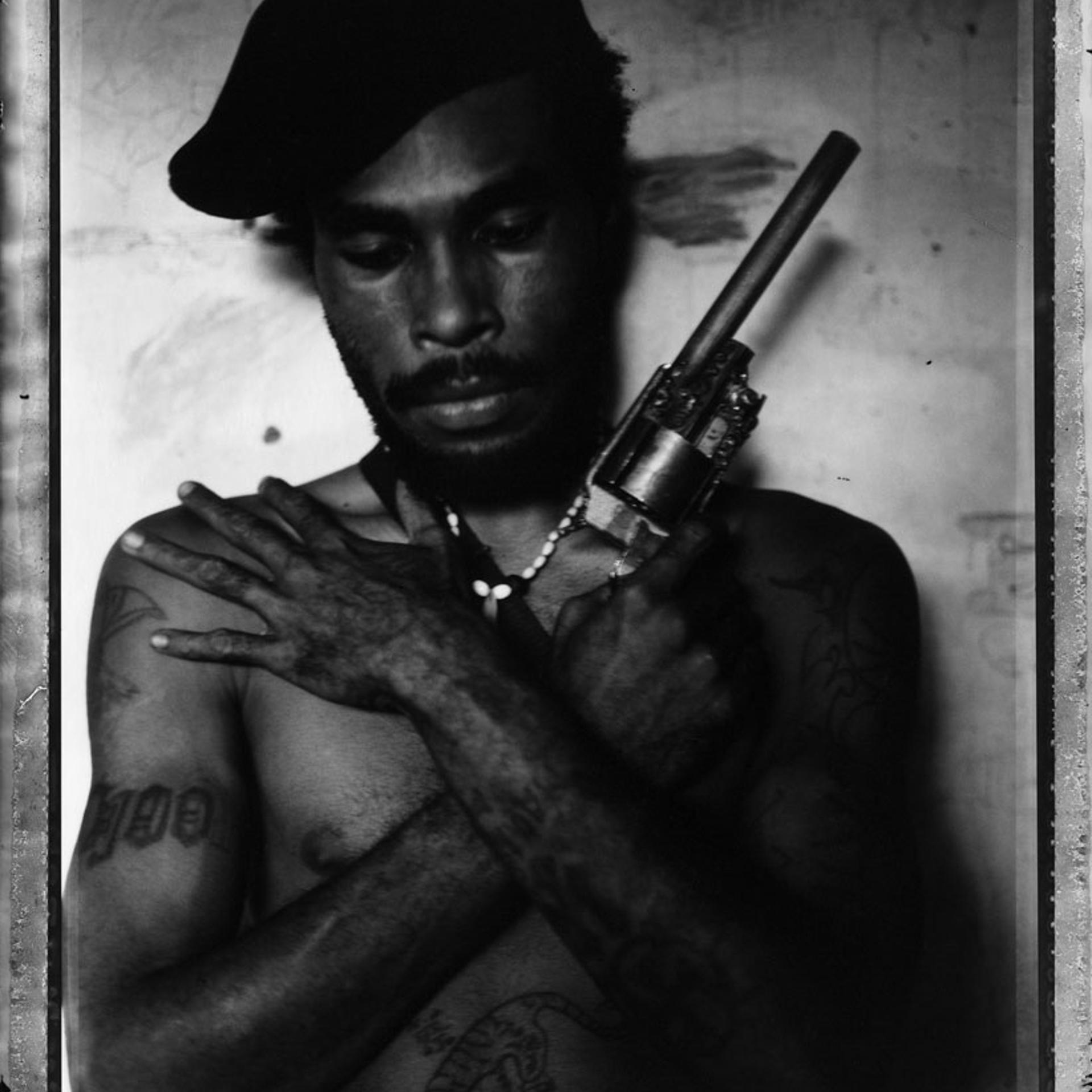 <i>Raskols: The Gangs of Papua New Guinea, published by powerHouse Books this month.</i></br>All portraits in this series were taken in Papua New Guinea in 2004</i></br>Omsy