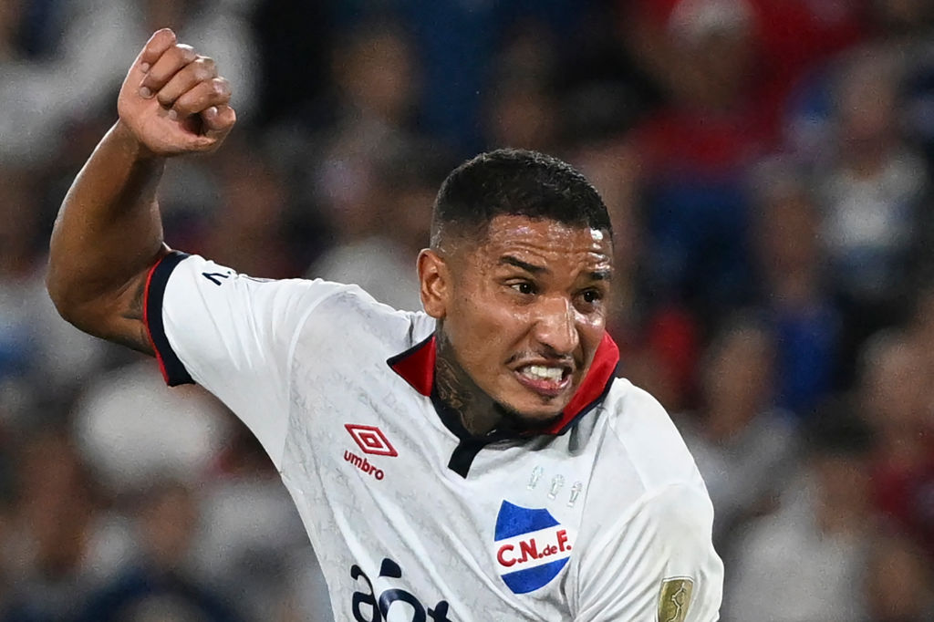 Juan Izquierdo fights for the ball during the Copa Libertadores match between Uruguay's Nacional and Bolivia's Always Ready at the Gran Parque Central stadium in Montevideo, on March 14, 2024.