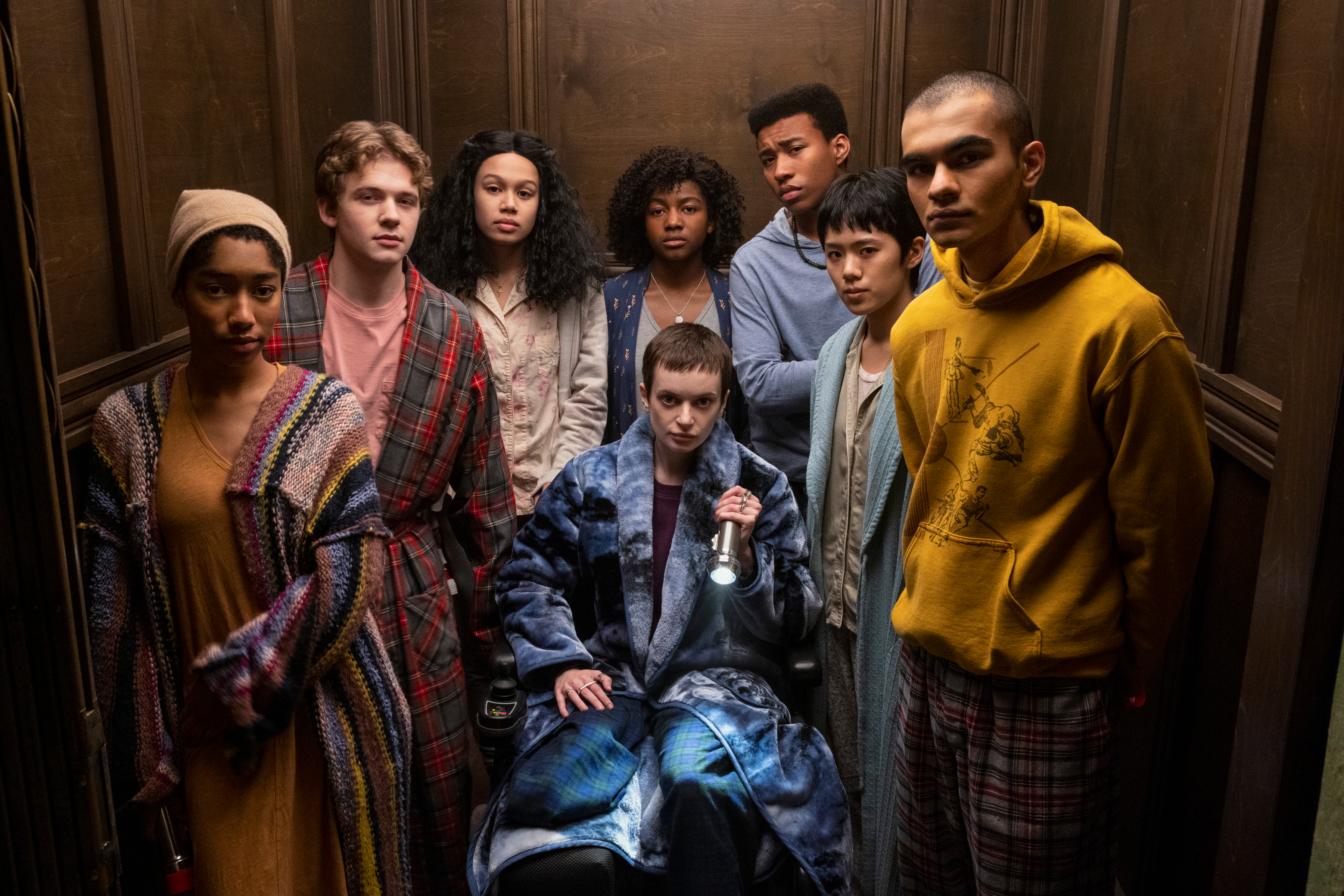 The Midnight Club. (L to R) Iman Benson as Ilonka, Igby Rigney as Kevin, Annarah Cymone as Sandra, Ruth Codd as Anya, Adia as Cheri Ian, Chris Sumpter as Spencer, Aya Furukawa as Natsuki, Sauriyan Sapkota as Amesh in episode 104 of The Midnight Club. Cr.