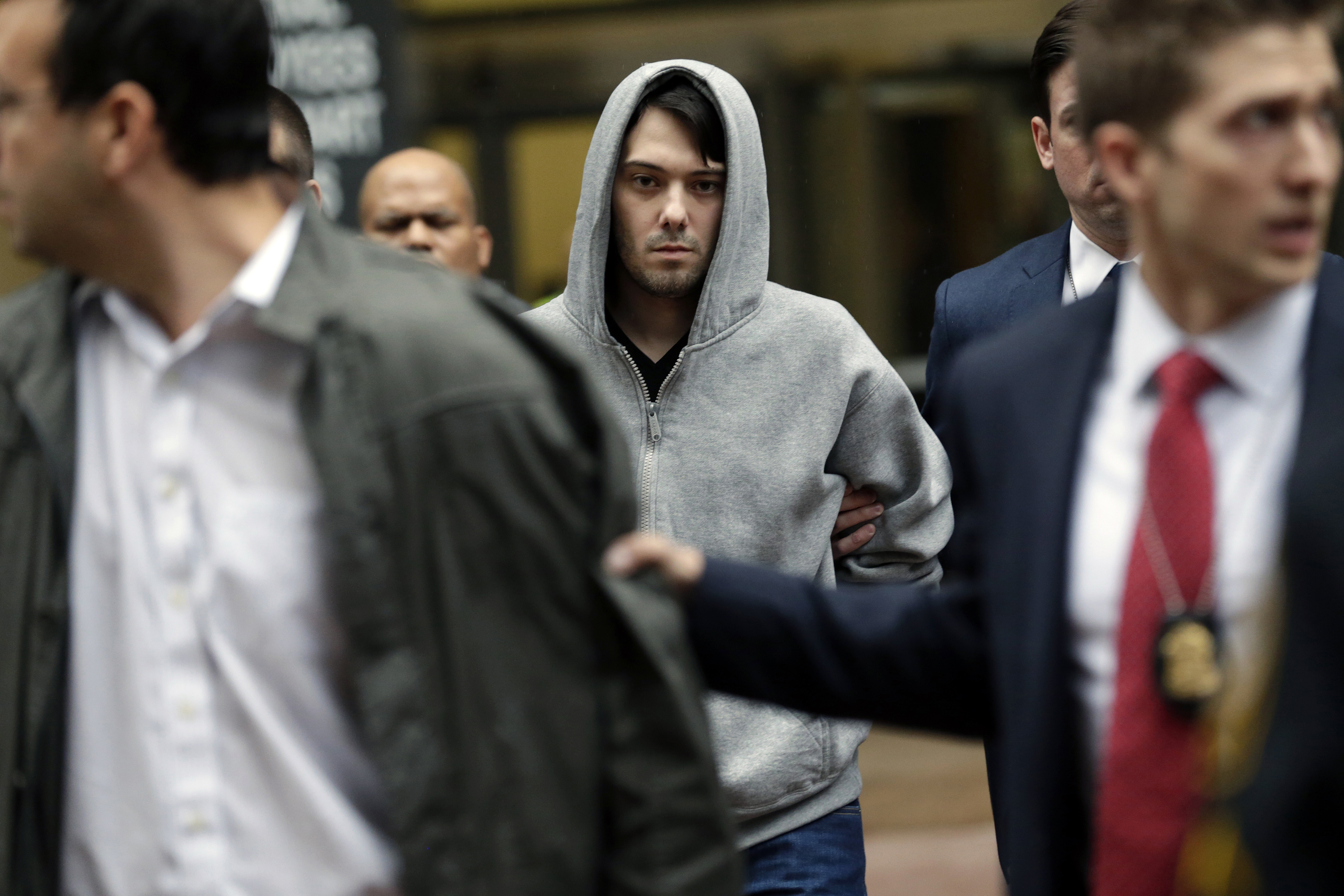 Martin Shkreli, CEO Reviled for Drug Price Gouging, Arrested on Securities Fraud Charges