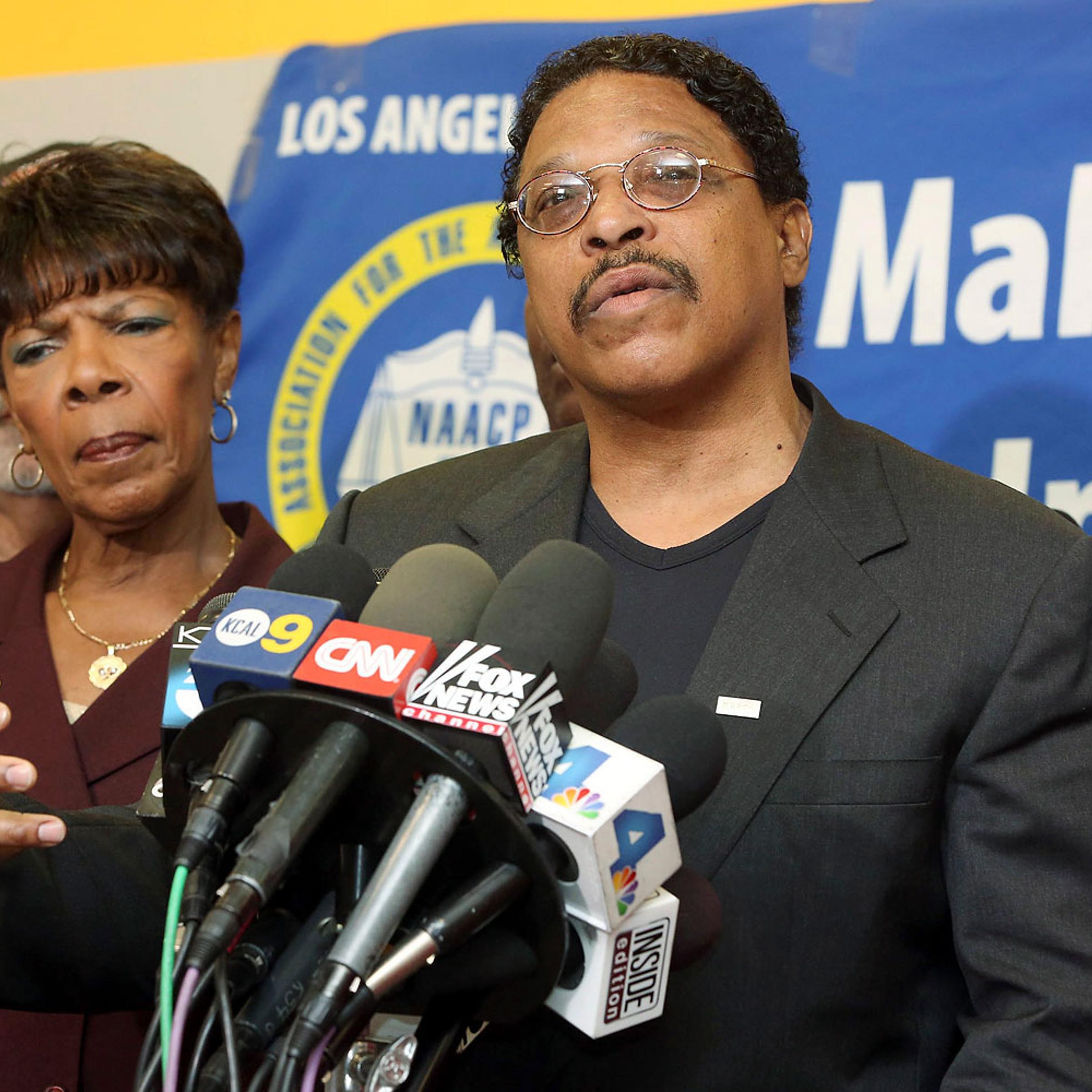 Leon Jenkins, right, president of the Los Angeles chapter of the NAACP, announces that Los Angeles Clippers owner Donald Sterling will not be receiving his lifetime achievement award, at a news conference in Culver City, Calif., April 28, 2014.