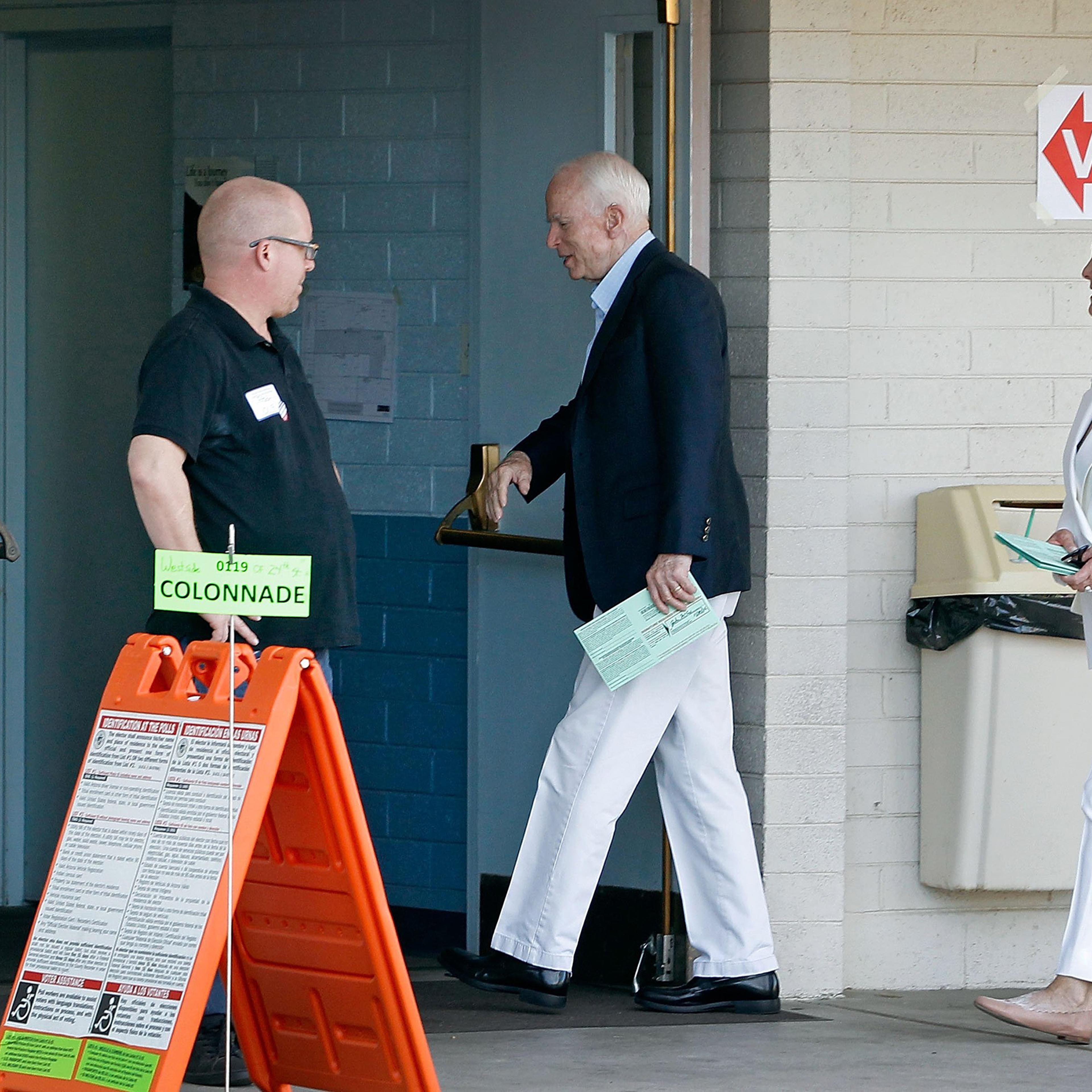 Republican Senator John McCain and his wife Cindy arrive at the Mountain View Christian Church polling place to cast their vote in Phoenix on Nov. 8, 2016.