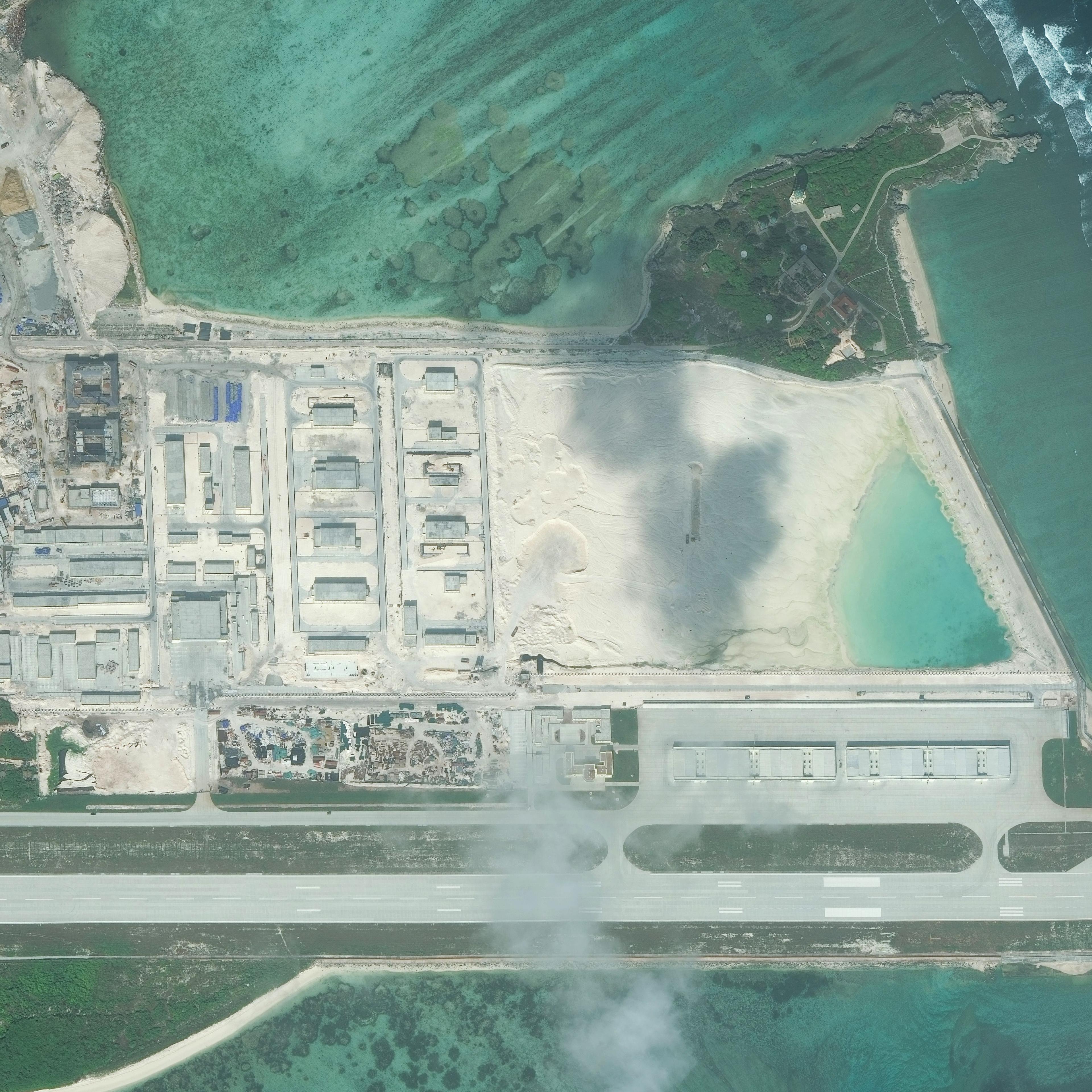 DigitalGlobe closeup ver3 imagery from 09 January 2016 of Woody Island. Woody Island is also known as Yongxing Island and Phu Lam Island and is the largest of the Paracel Islands in the South China Sea.