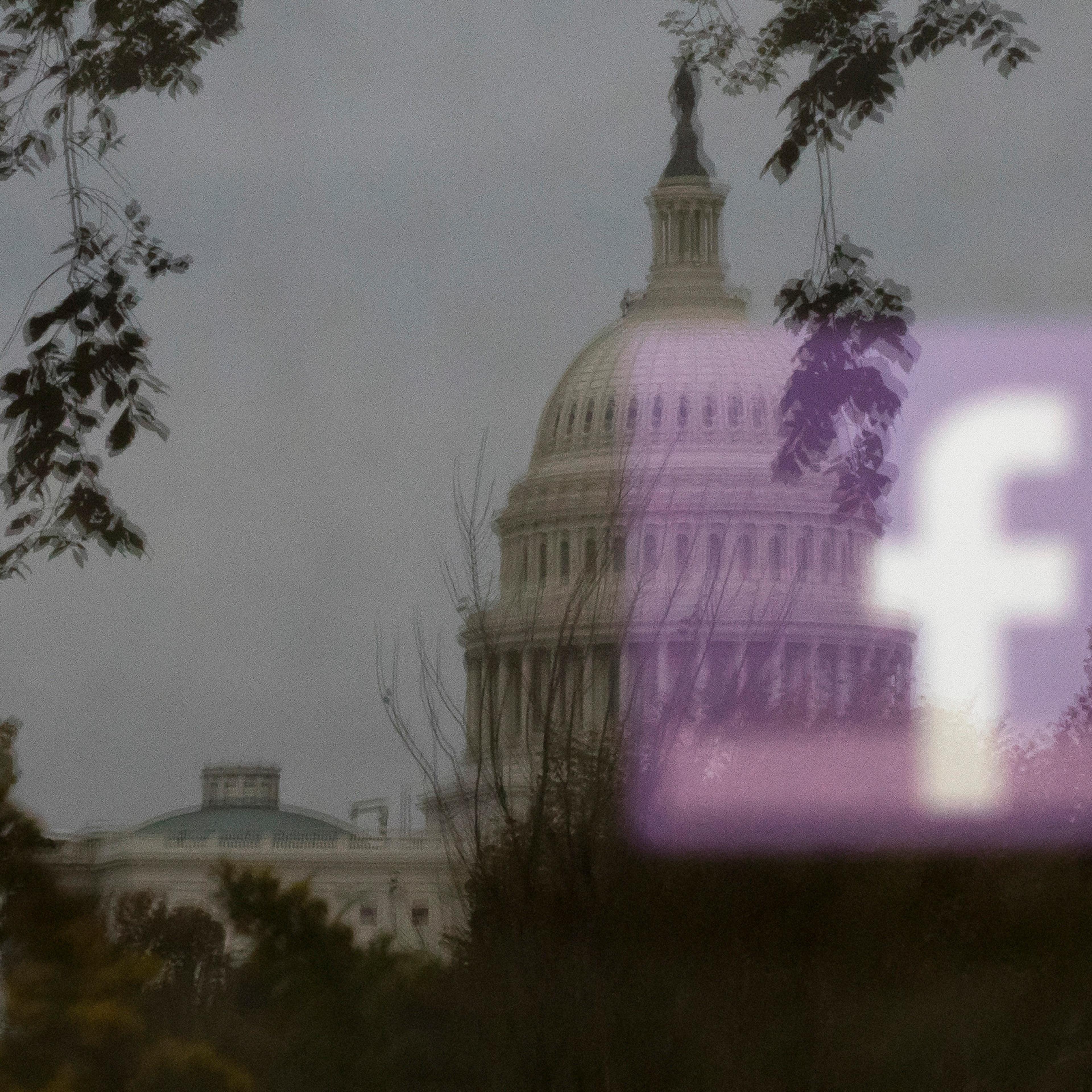 A Facebook logo is reflected on an advertisement board outside the Capitol in Washington, Oct. 25, 2018. (Tom Brenner/The New York Times)