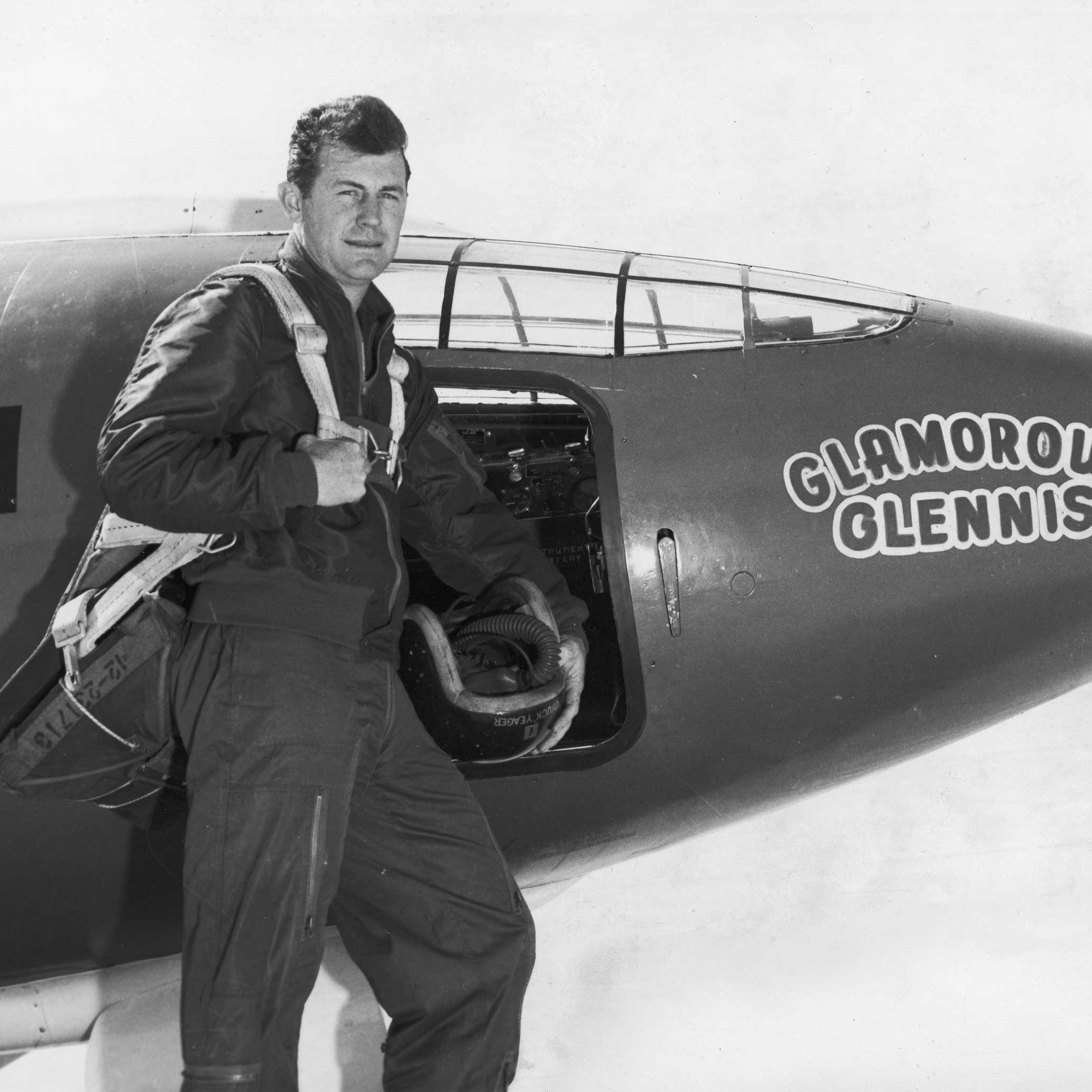 United States Air Force Capt. Chuck Yeager stands beside the plane in which he became the first pilot to break the sound barrier, 1947.