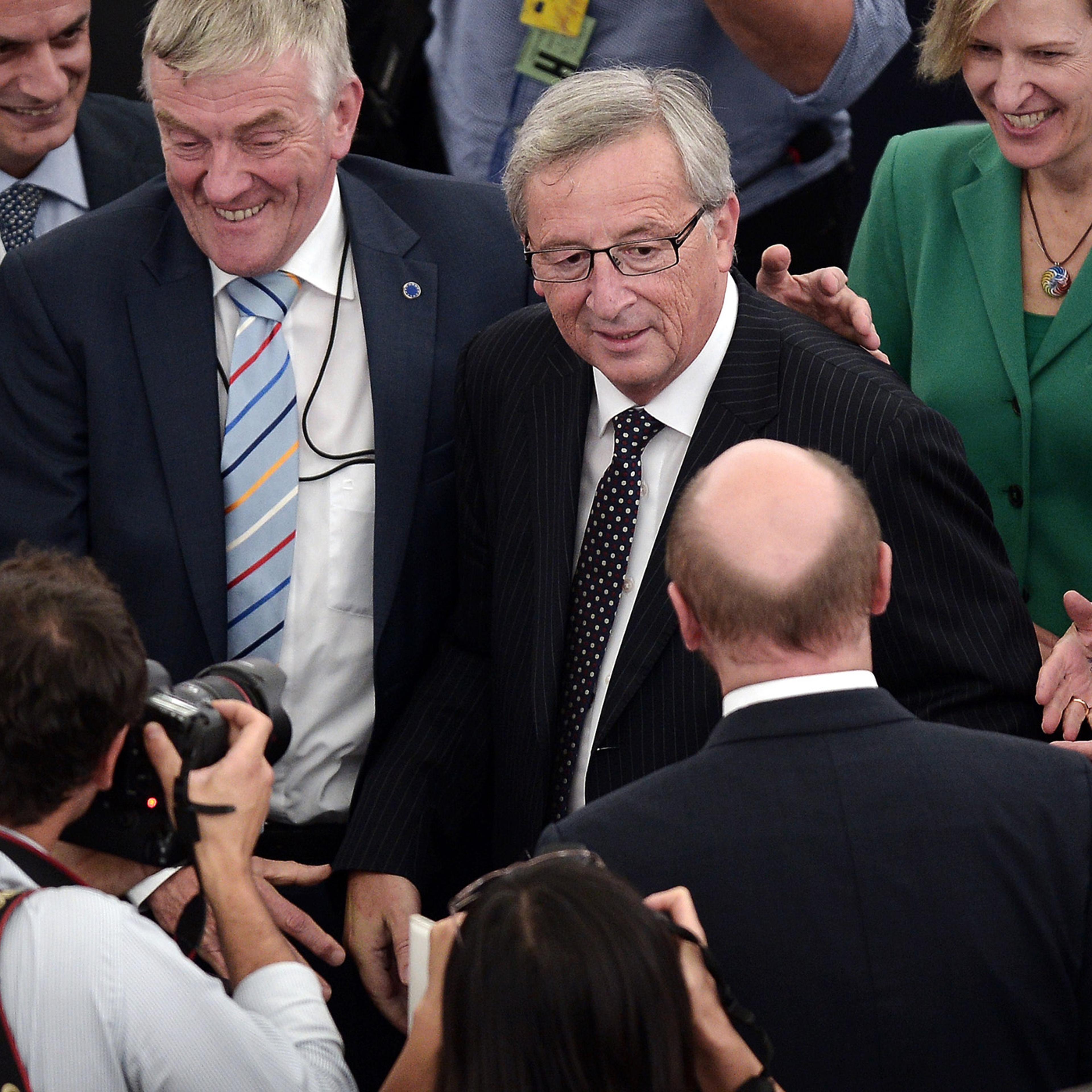 Newly elected President of the European Commission, Jean-Claude Juncker is congratulated on July 15, 2014, in the European Parliament in Strasbourg, France.