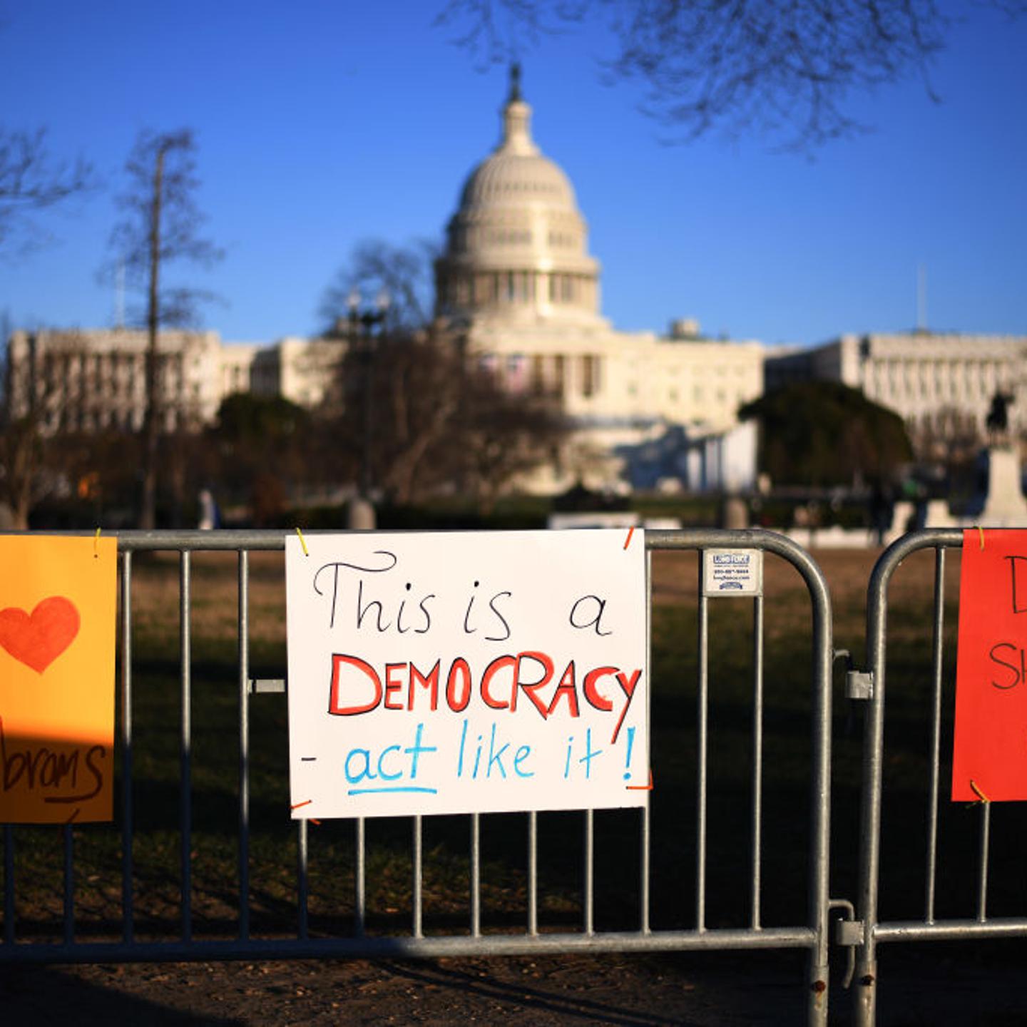 WASHINGTON, DC, JANUARY 9: People place pro democracy signs at