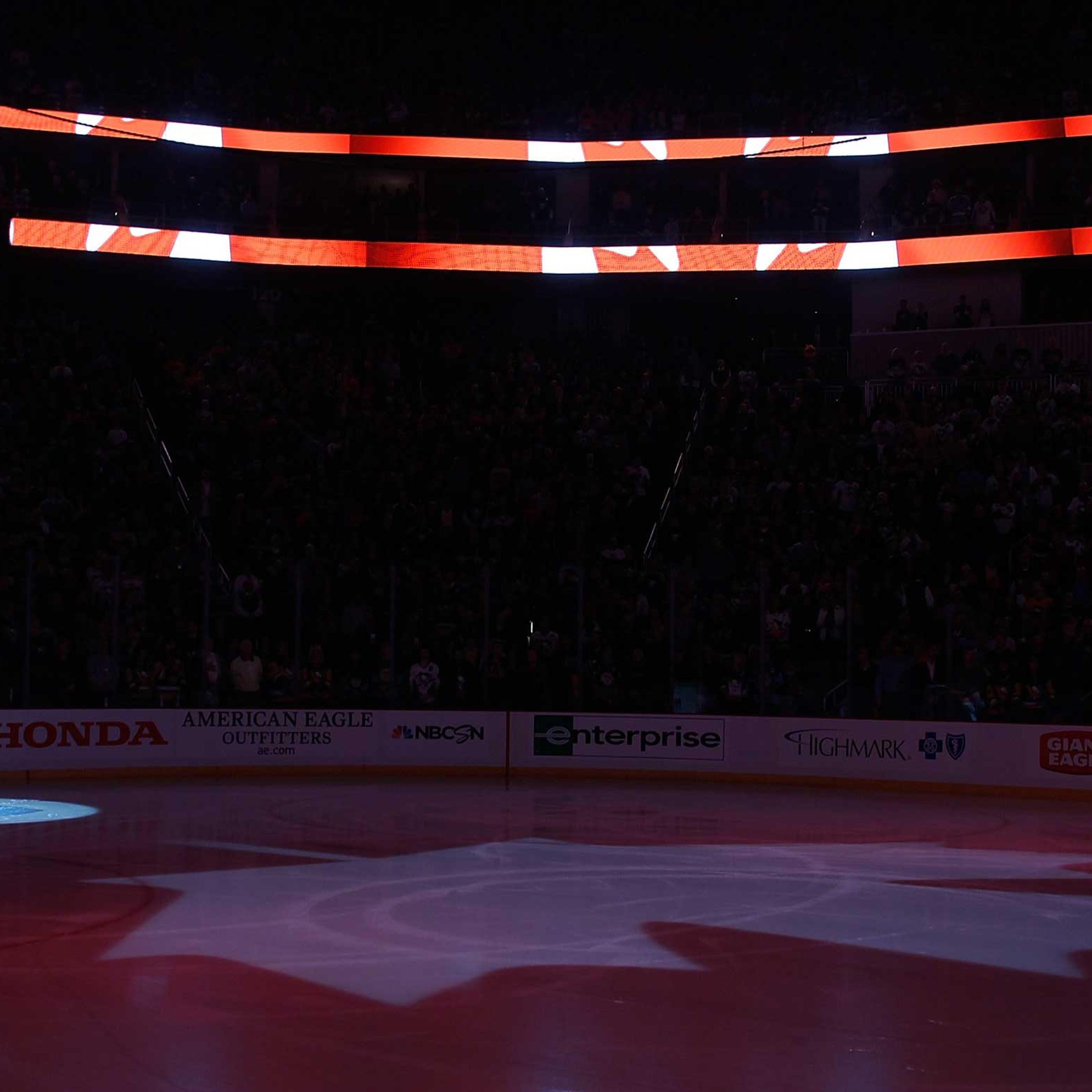 The Canadian National Anthem is performed in honor of the shooting victims in Ottawa during the game between the Philadelphia Flyers and Pittsburgh Penguins at Consol Energy Center on Oct. 22, 2014 in Pittsburgh, Pa.