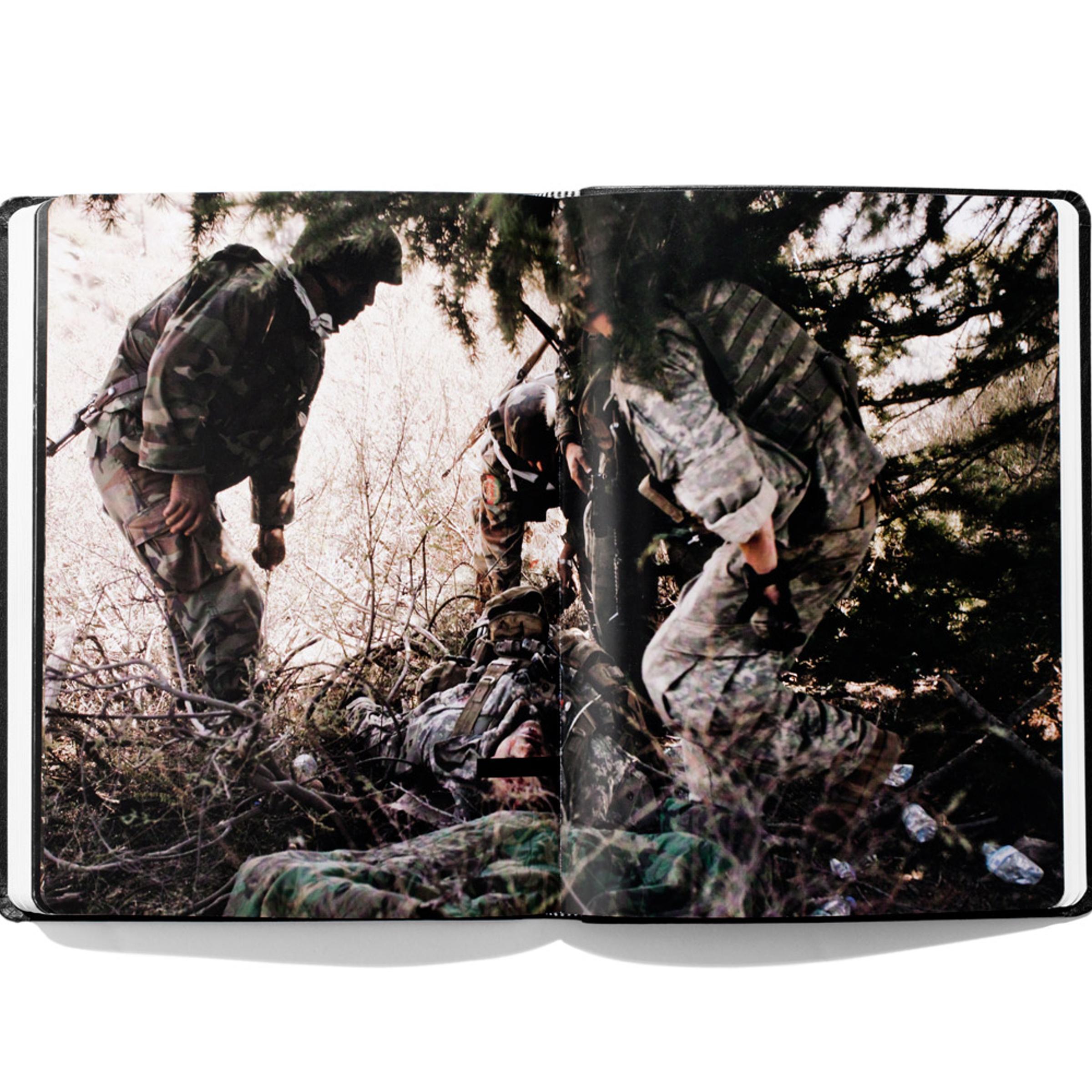 <i>Larry Rougle</i> from Tim Hetherington's 2010 book <i>Infidel</i>. <br><br>Hetherington mentions his photographs from Afghanistan in the essay below.
