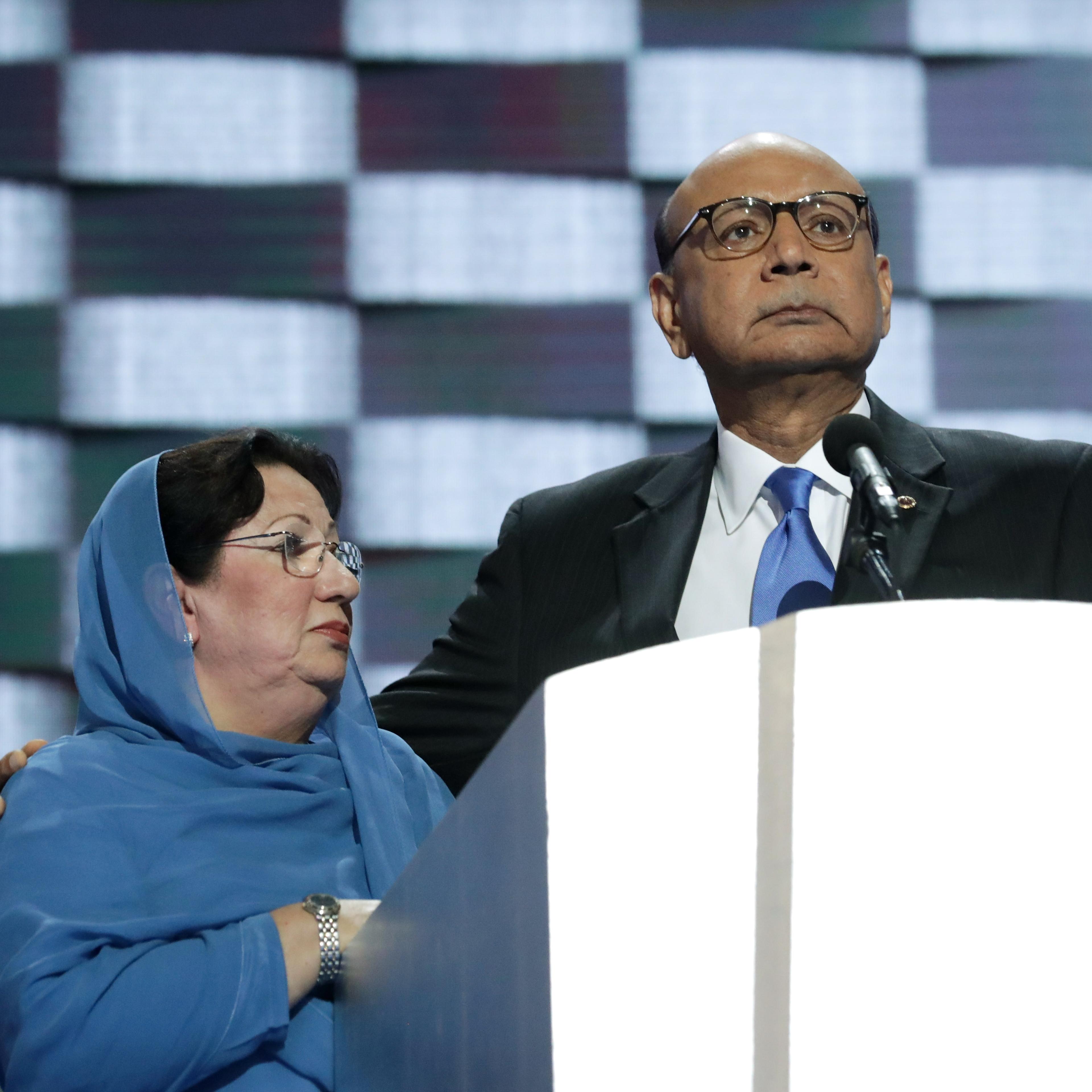 Khizr Khan speaks beside Ghazala Khan at the Democratic National Convention