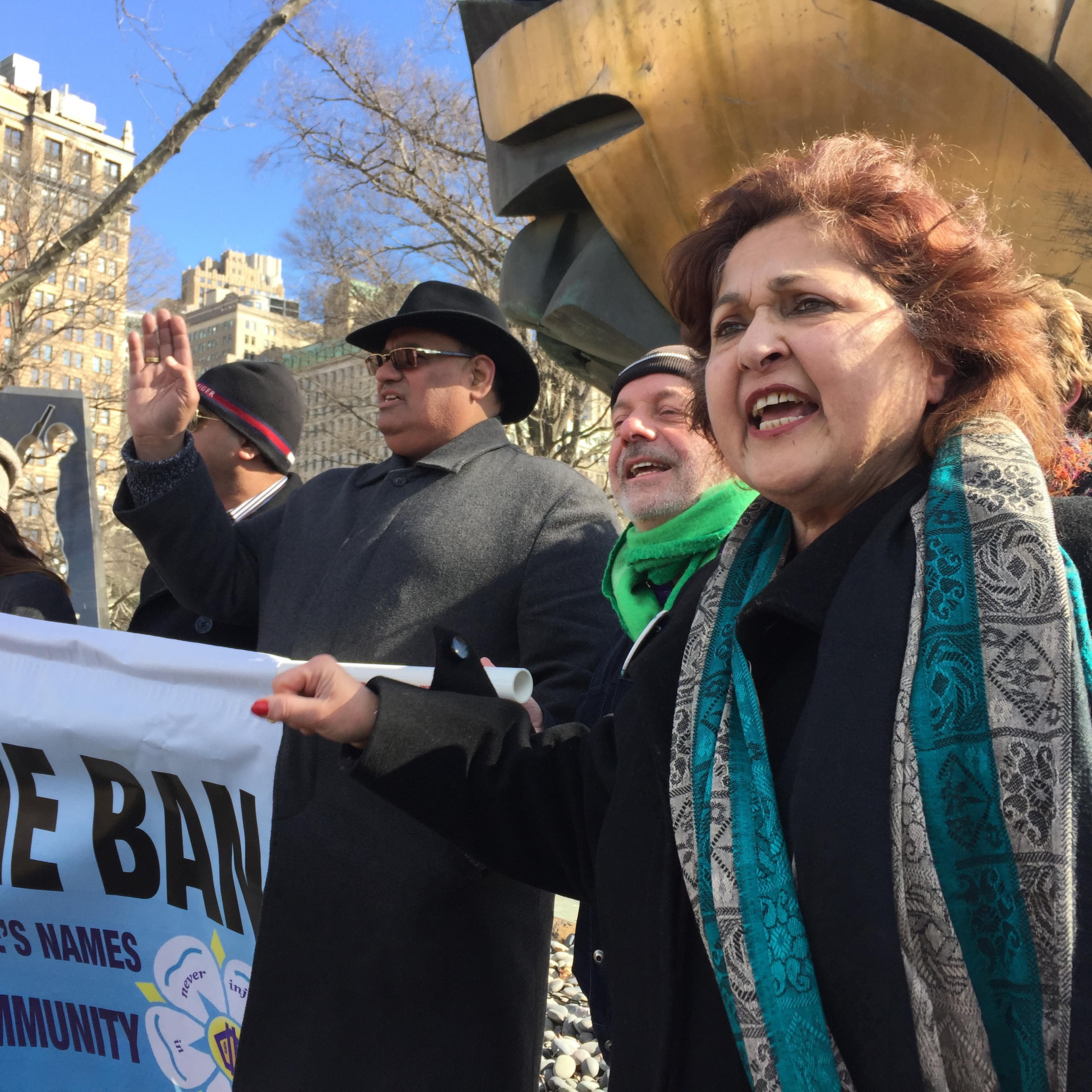 Talat Hamdani (right) and other family members of 9/11 victims rally against President Donald Trump's immigration order in New York City on Feb. 16, 2017.