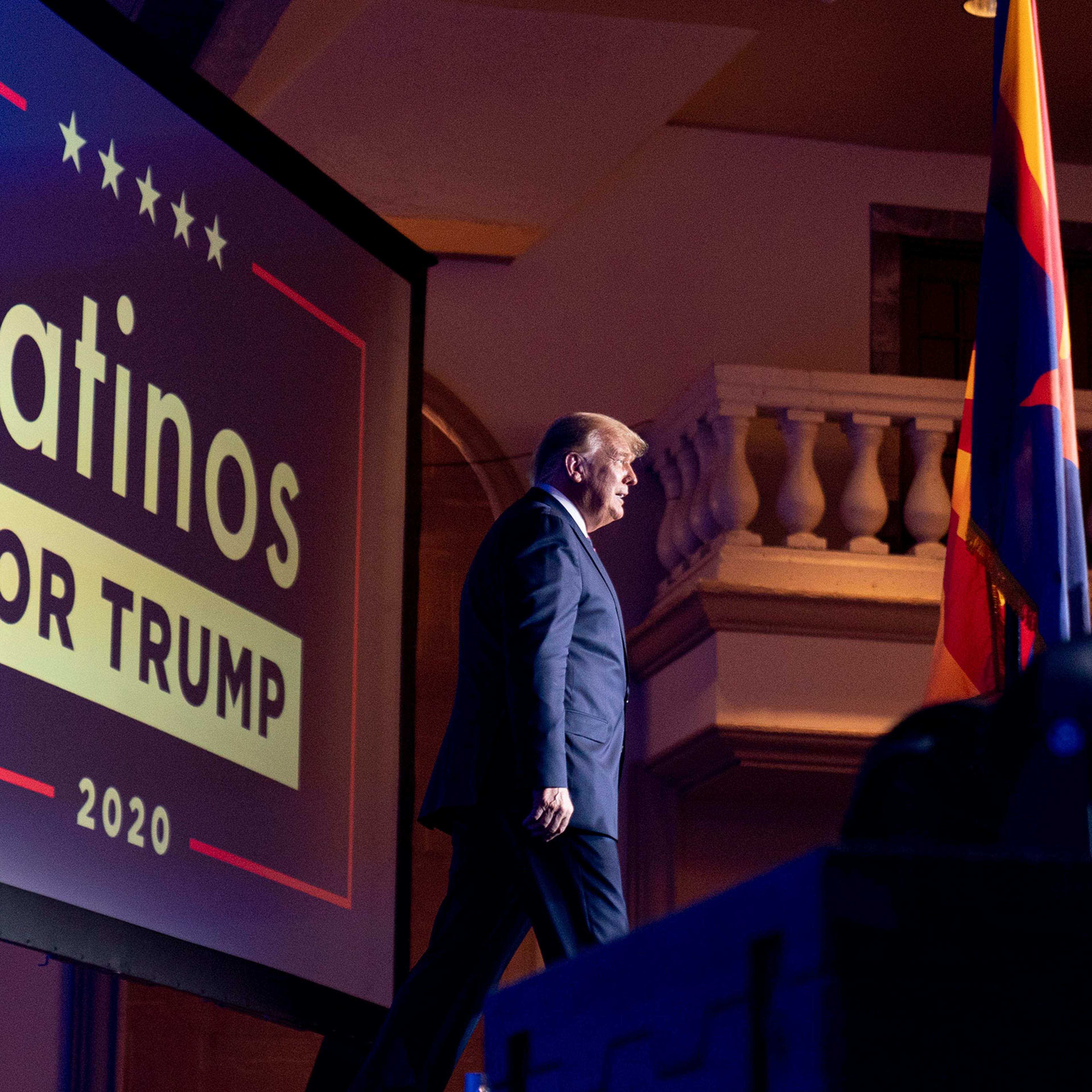 President Donald Trump arrives for a Latinos for Trump Coalition roundtable at Arizona Grand Resort in Phoenix