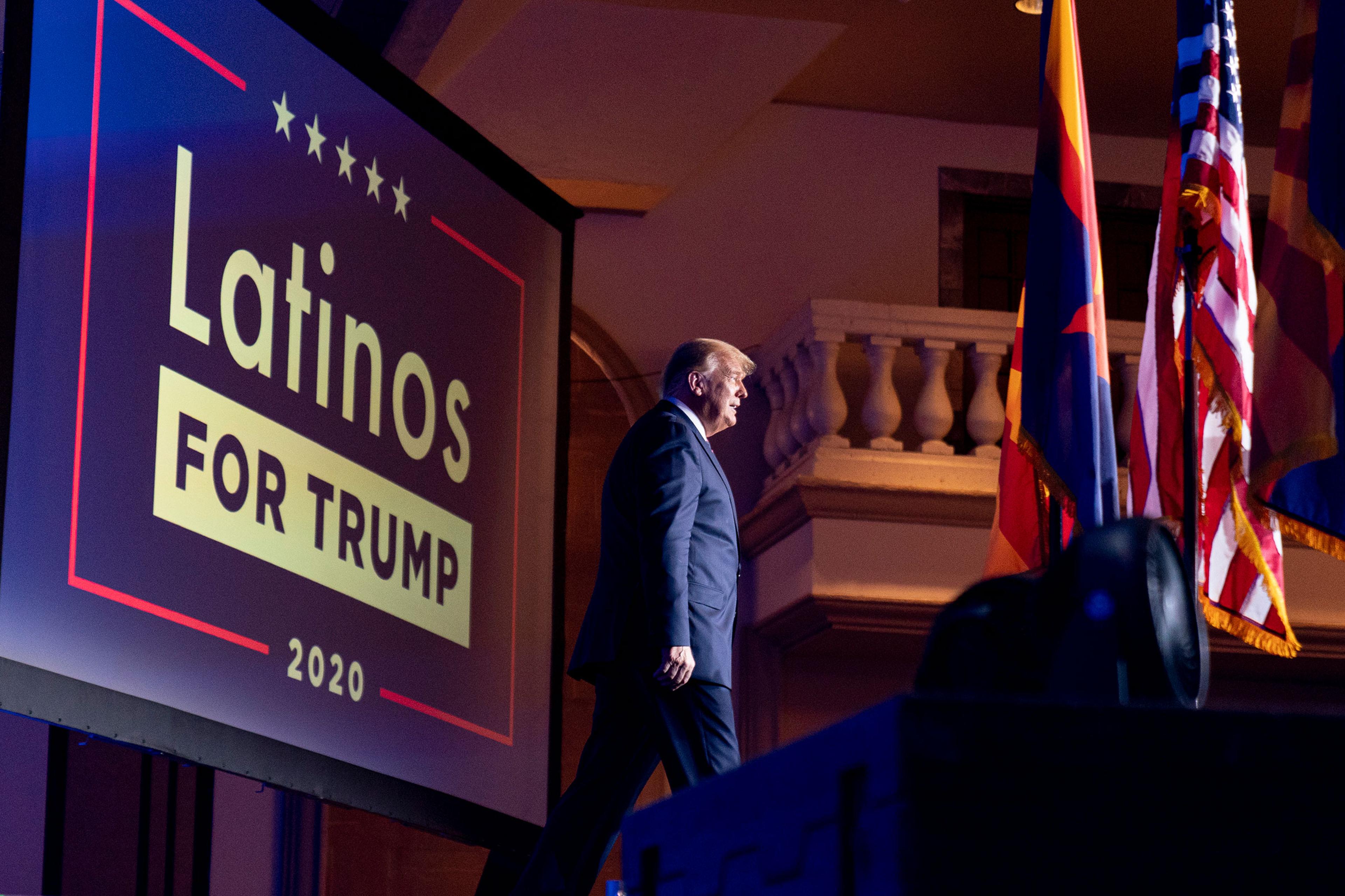 President Donald Trump arrives for a Latinos for Trump Coalition roundtable at Arizona Grand Resort in Phoenix
