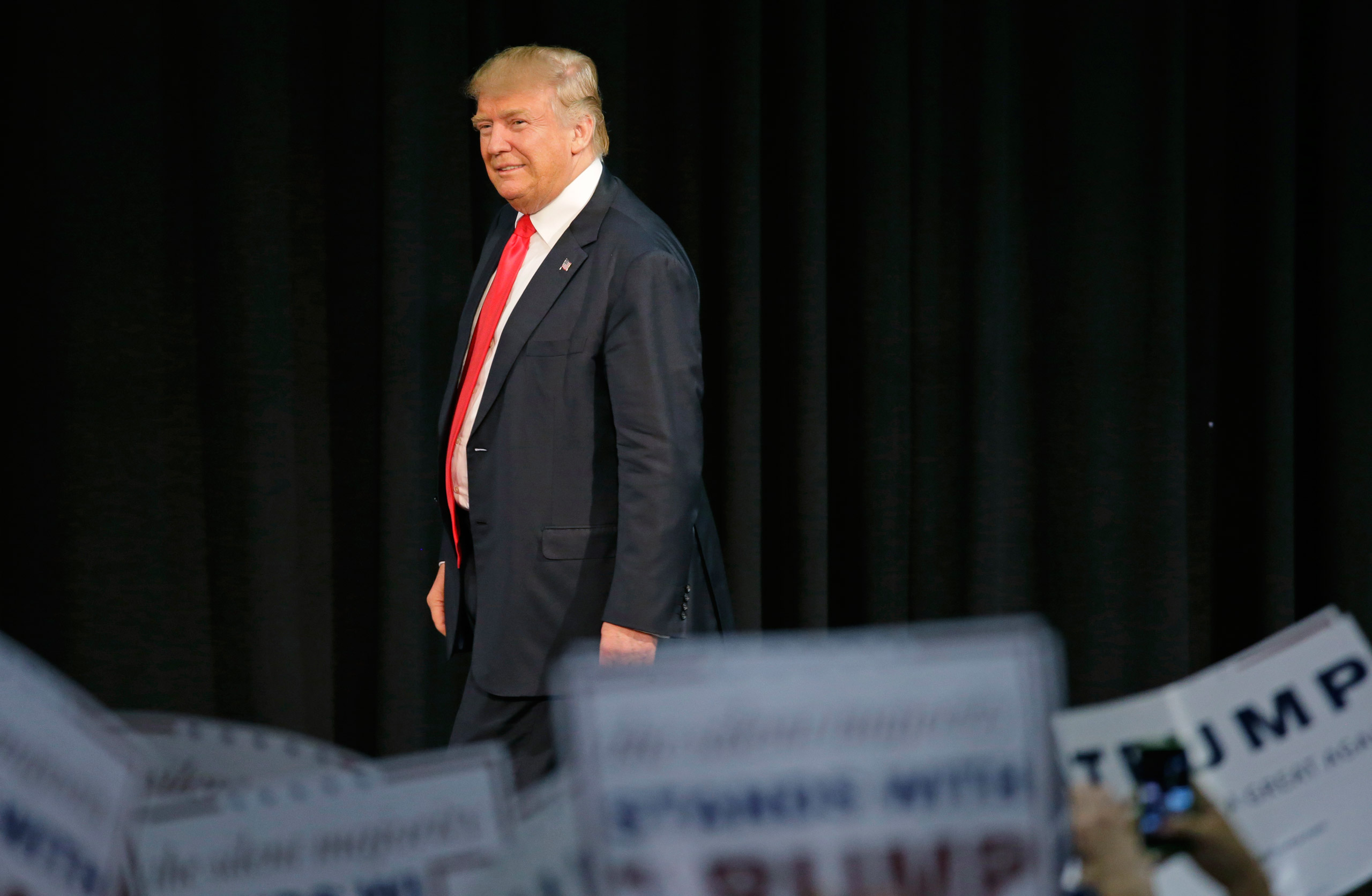 Republican presidential candidate Donald Trump looks over the crowd before speaking at a rally in Eugene, Ore., Friday, May 6, 2016. (AP Photo/Ted S. Warren)