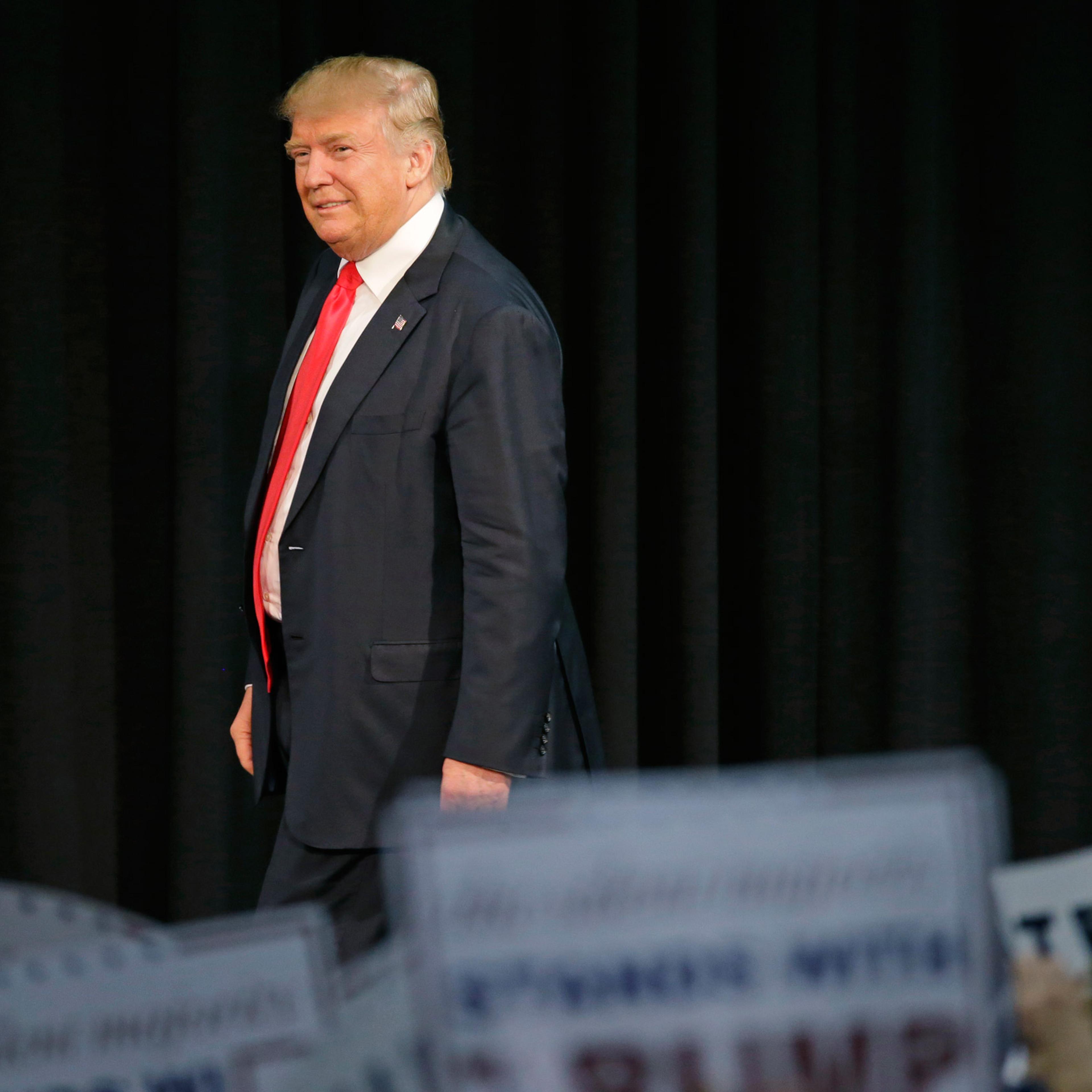 Republican presidential candidate Donald Trump looks over the crowd before speaking at a rally in Eugene, Ore., Friday, May 6, 2016. (AP Photo/Ted S. Warren)