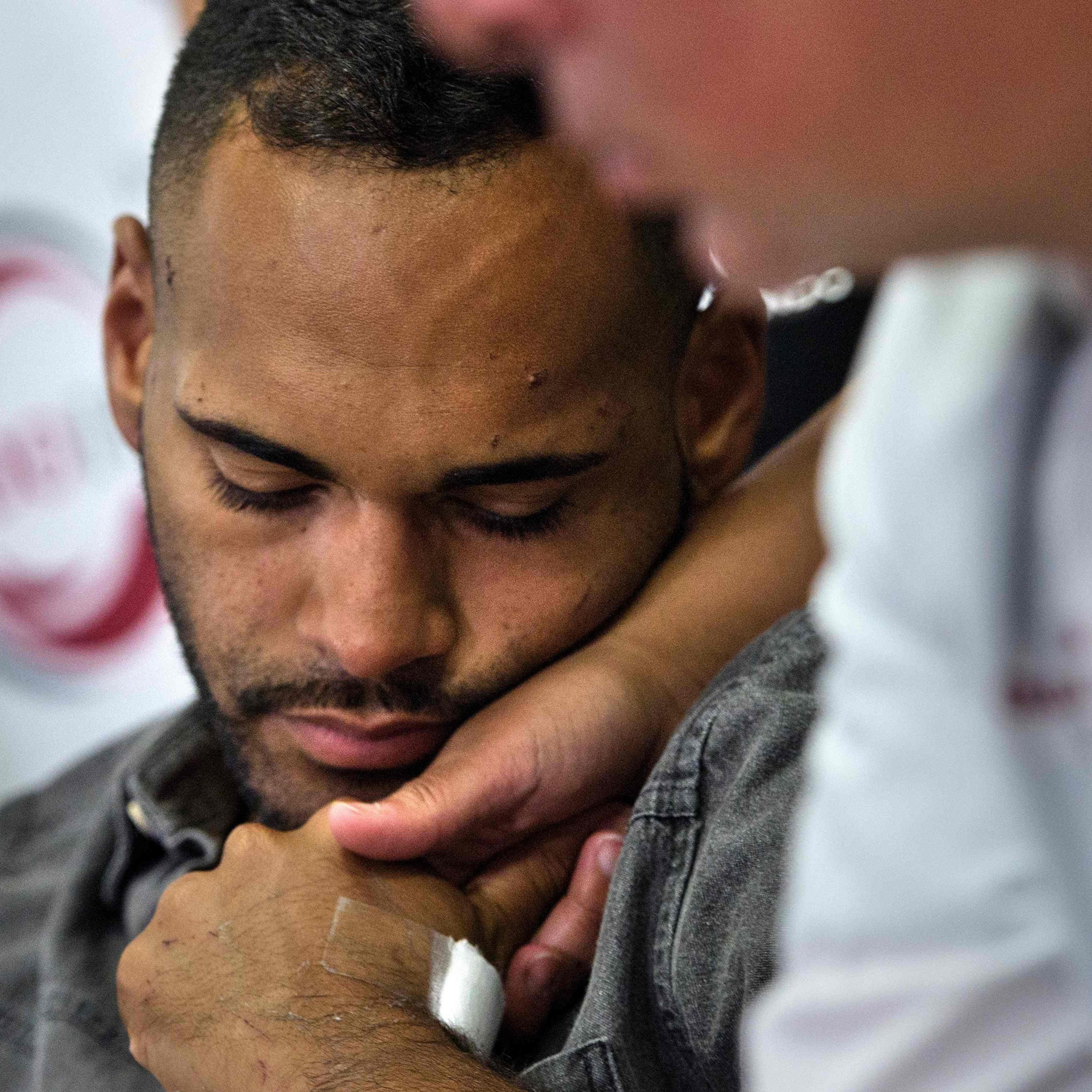 Angel Colon, a survivor of the Pulse nightclub mass shooting, waits to speak during a press conference with Orlando Health trauma staff at Orlando Regional Medical Center in Orlando on June 14, 2016.