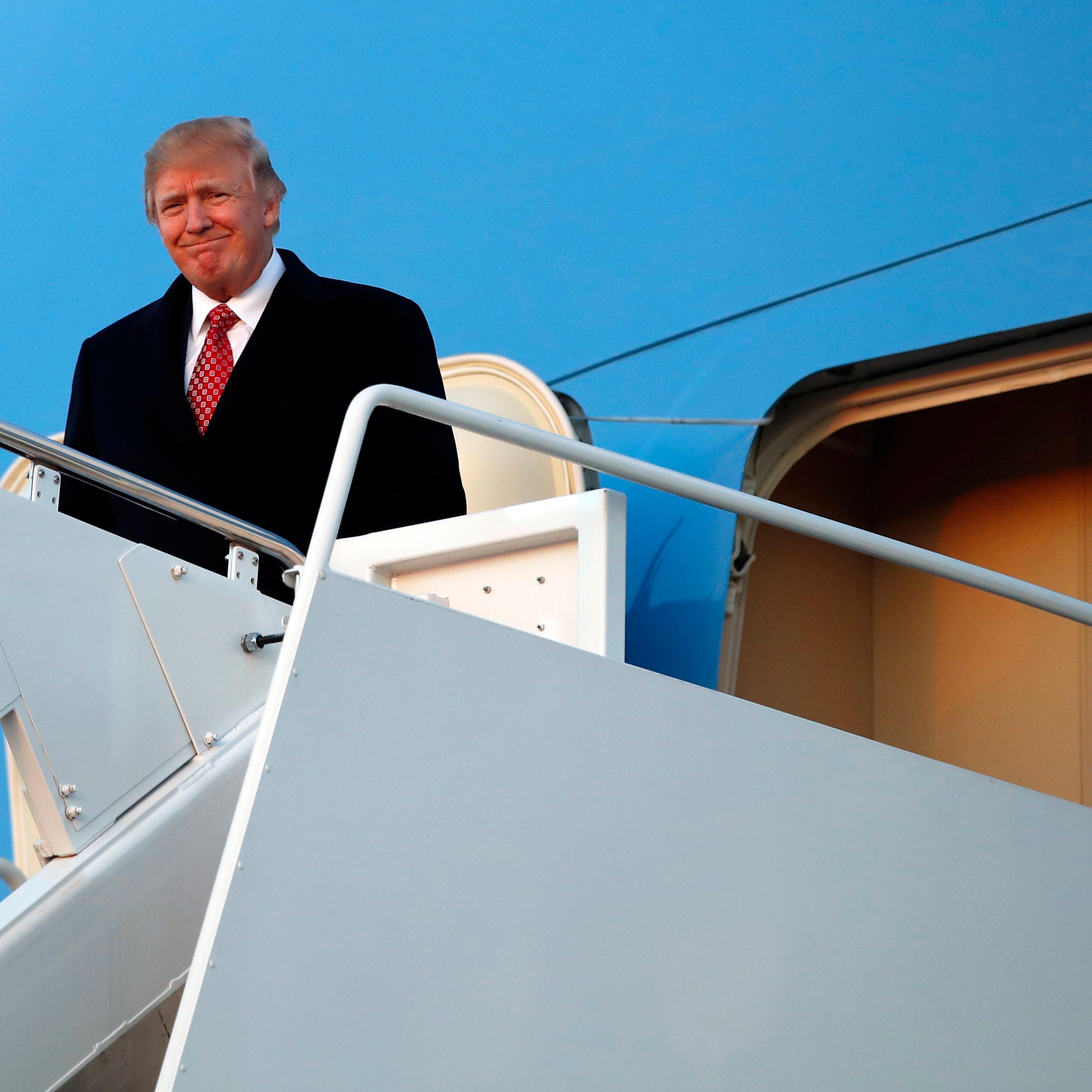 President Donald Trump disembarks Air Force One as he arrives on March 5, 2017, at Andrews Air Force Base, Md.