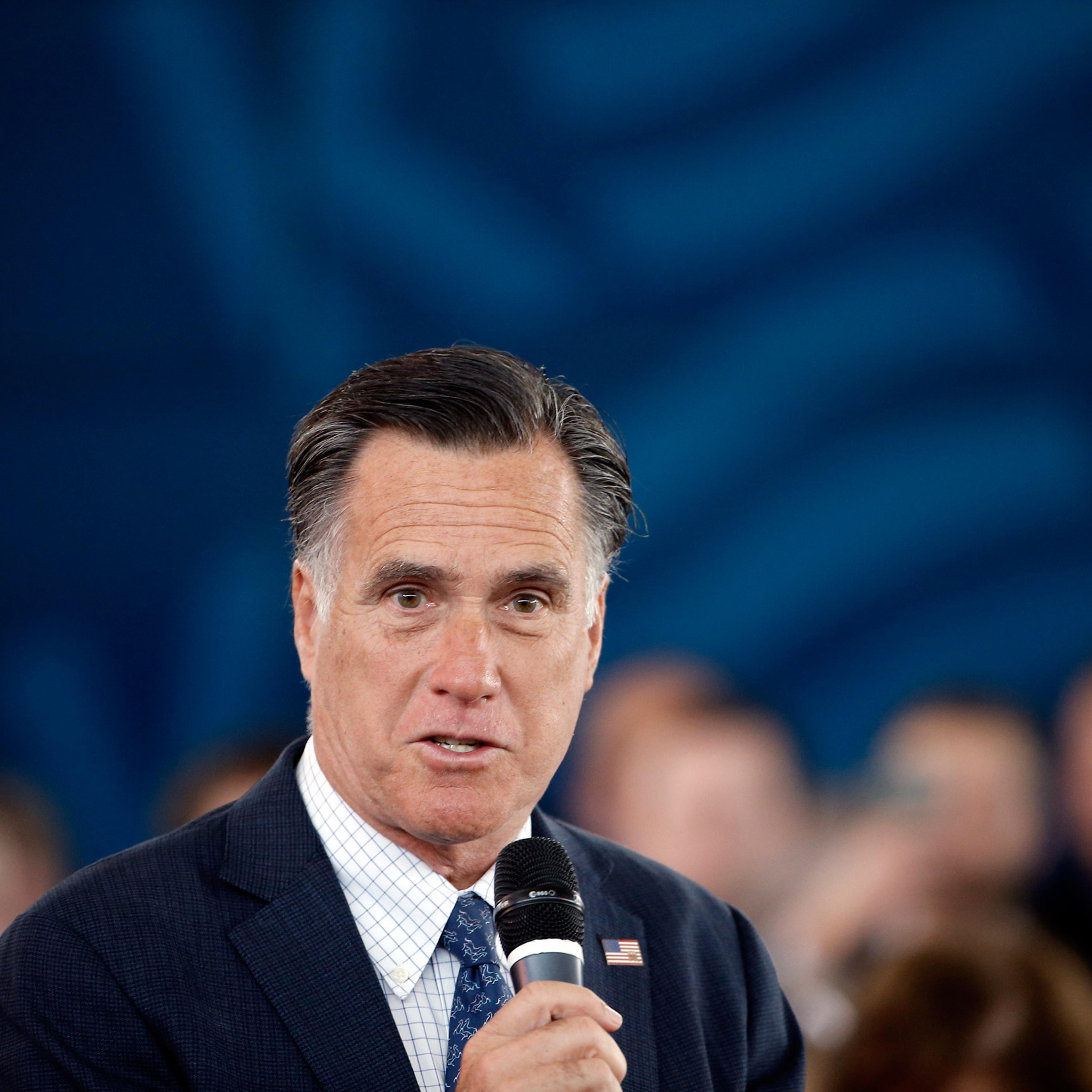 Former Republican presidential candidate Mitt Romney speaks during Republican presidential candidate, Ohio Gov. John Kasich campaign stop on Monday, March 14, 2016, at the MAPS Air Museum in North Canton, Ohio. (AP Photo/Matt Rourke)